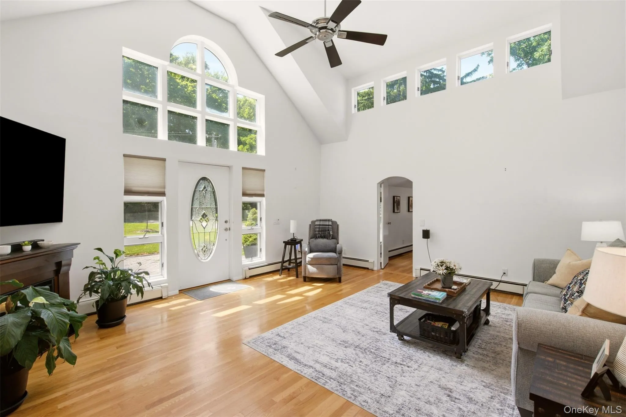 Sun filled Living Room W/ Hardwood Floors Sun filled Living Room W/ Hardwood Floors