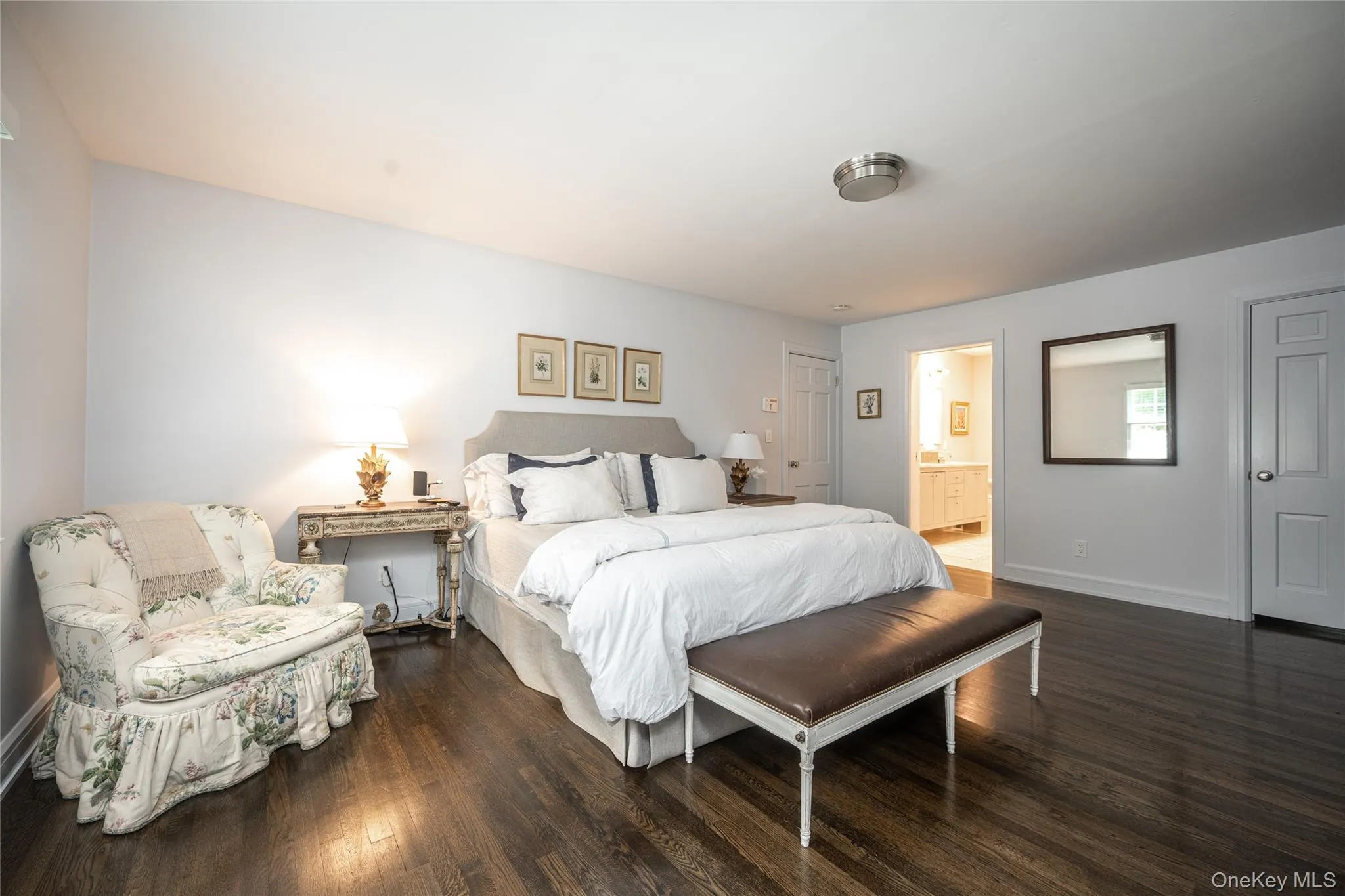 Primary Bathroom with Walk-In Closet and Pocket Door to Beautifully Renovated Bath. Primary Bathroom with Walk-In Closet and Pocket Door to Beautifully Renovated Bath.
