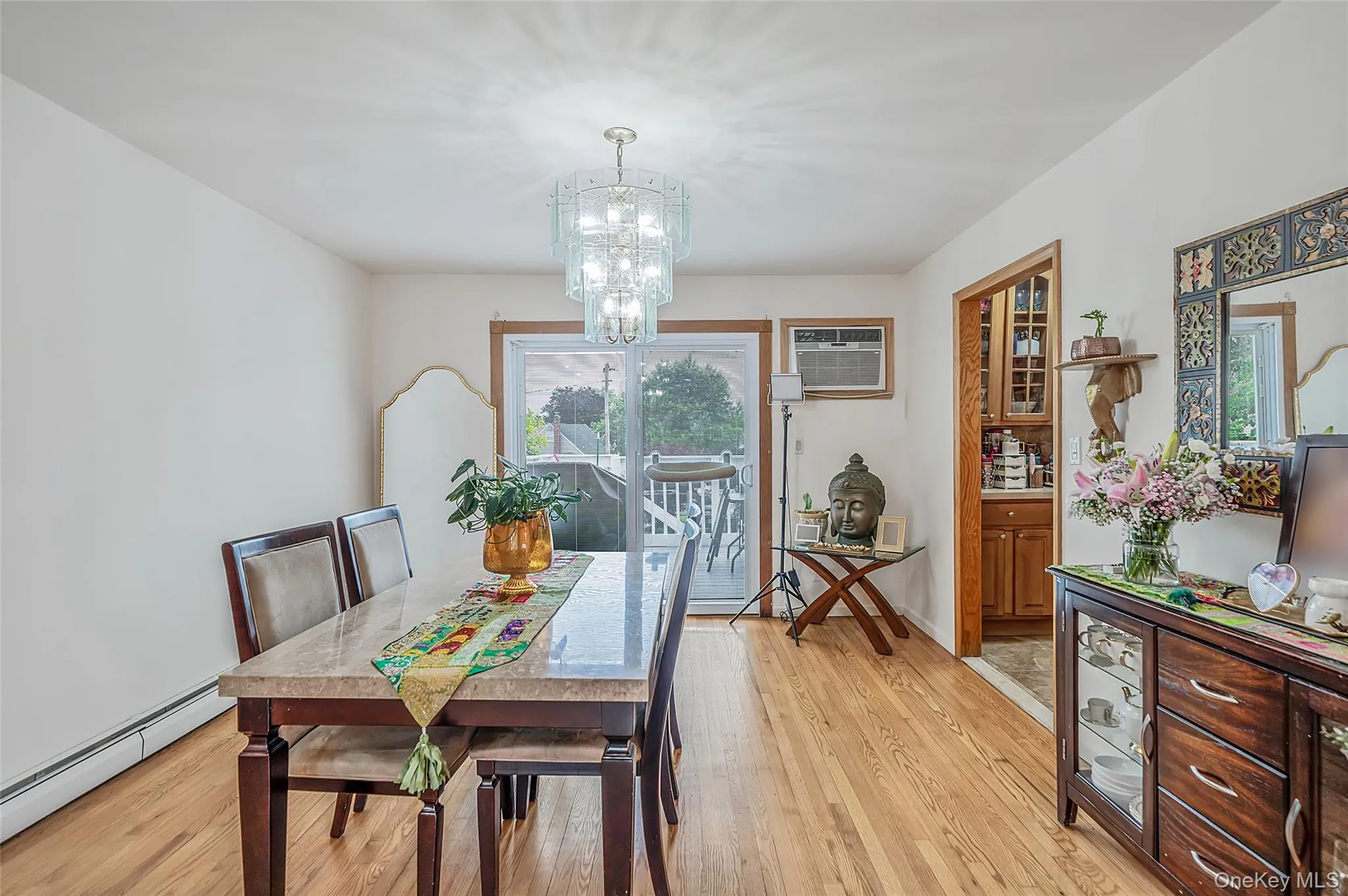 Dining room, wood floors, slider to upper deck Dining room, wood floors, slider to upper deck