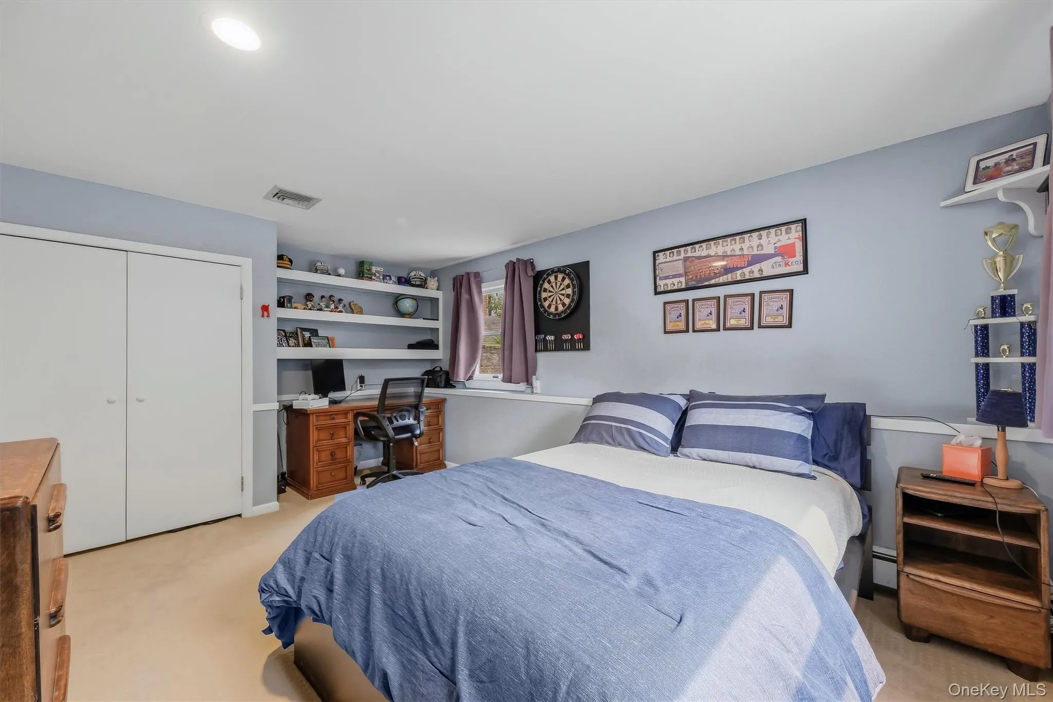 Bedroom #3 with good closet space and built in shelves. Bedroom #3 with good closet space and built in shelves.