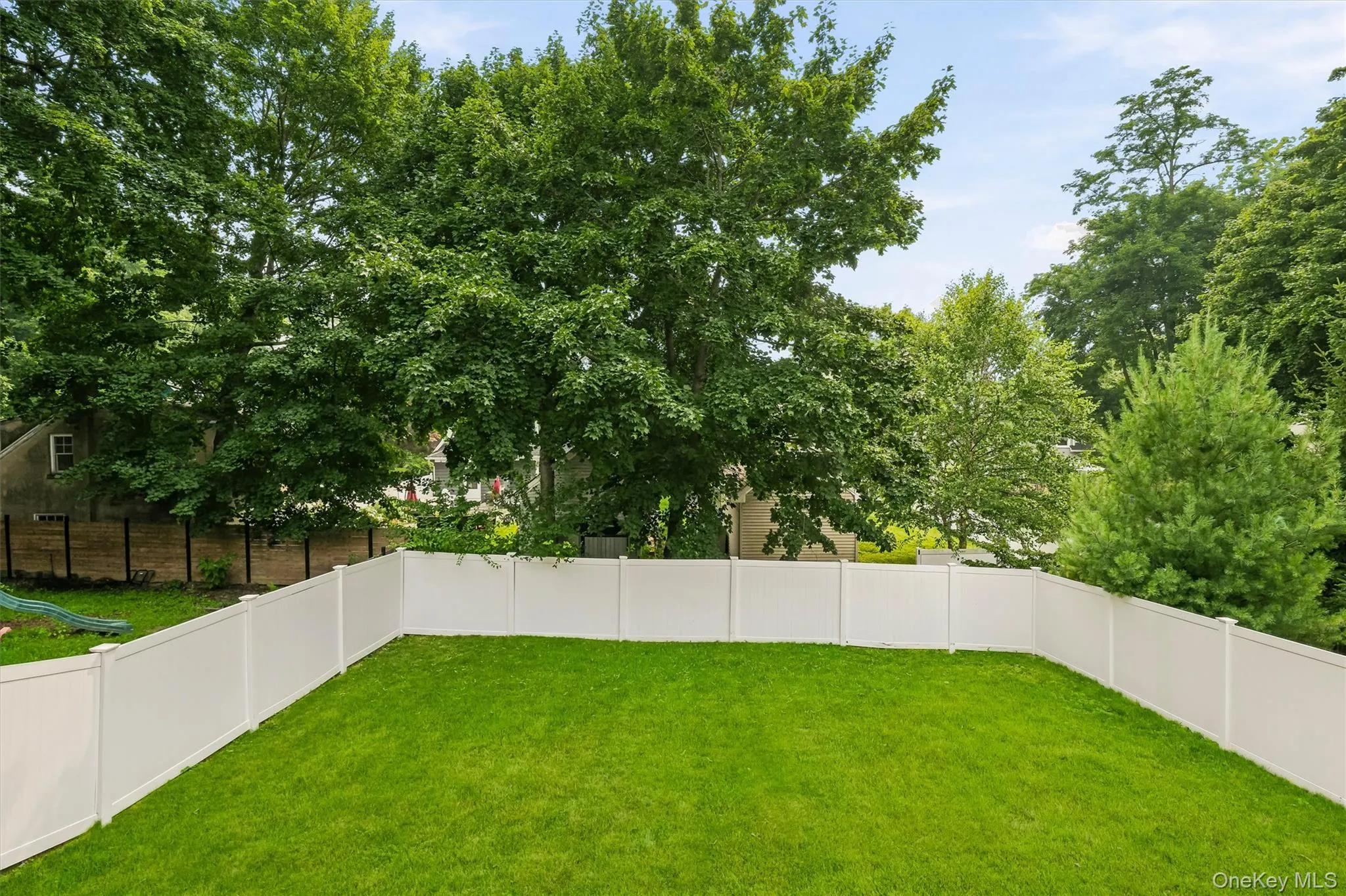 Wow...this fenced in yard will be great for many outdoor activities. Wow...this fenced in yard will be great for many outdoor activities.