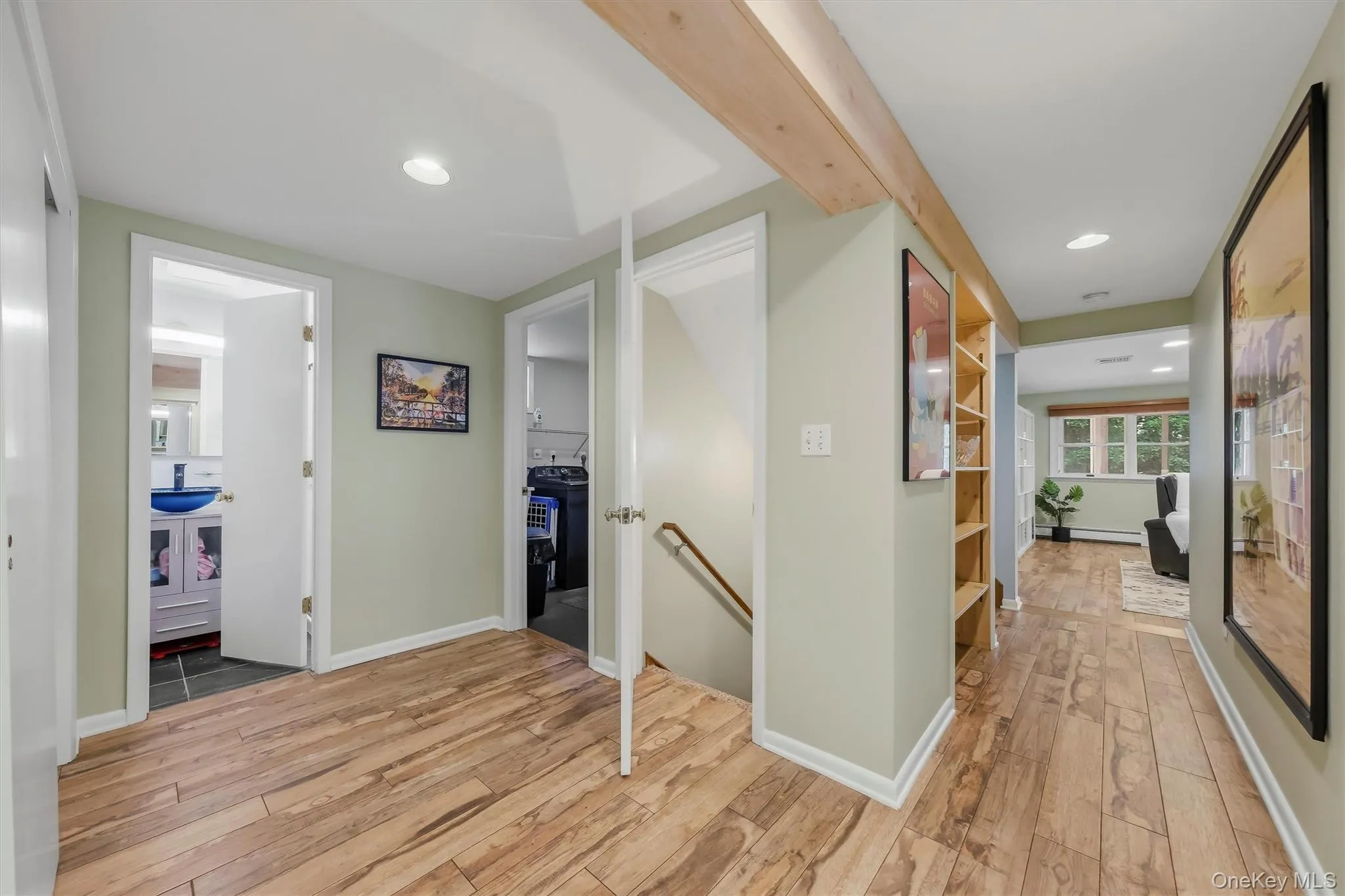View of level 2 hallway with staircase down to the lower level. View of level 2 hallway with staircase down to the lower level.
