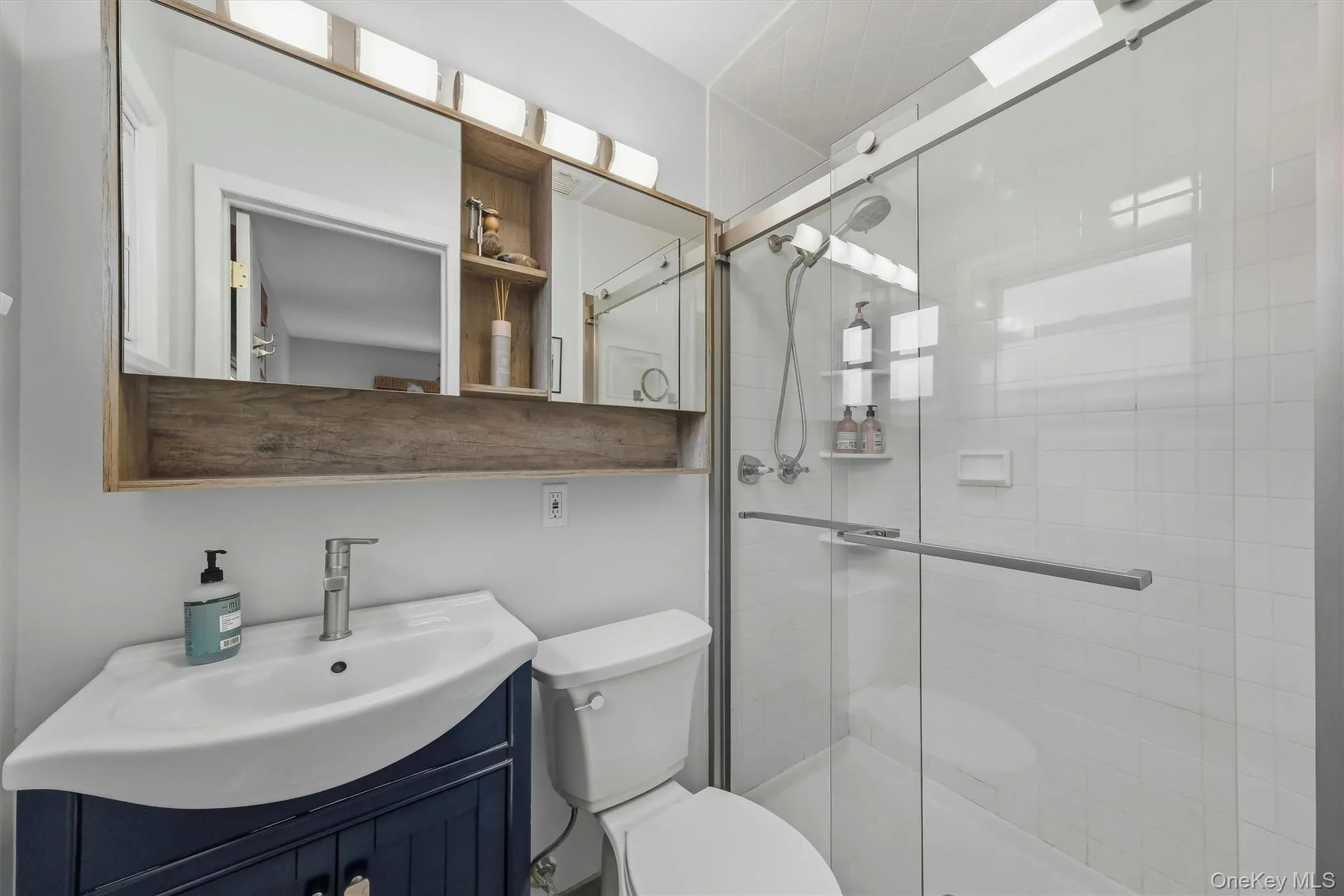 Updated bathroom with walk in shower. Updated bathroom with walk in shower.