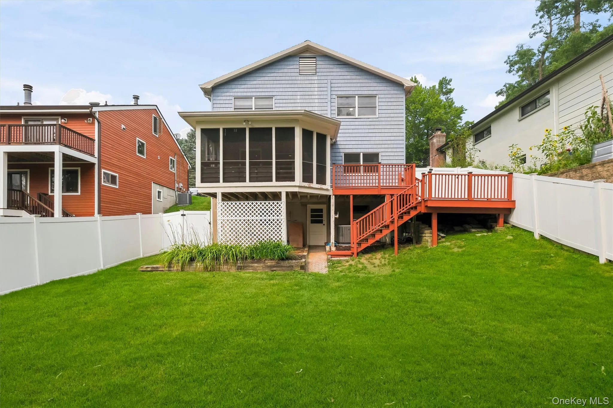 Access from upper screen in deck and lower basement door to level backyard. Access from upper screen in deck and lower basement door to level backyard.