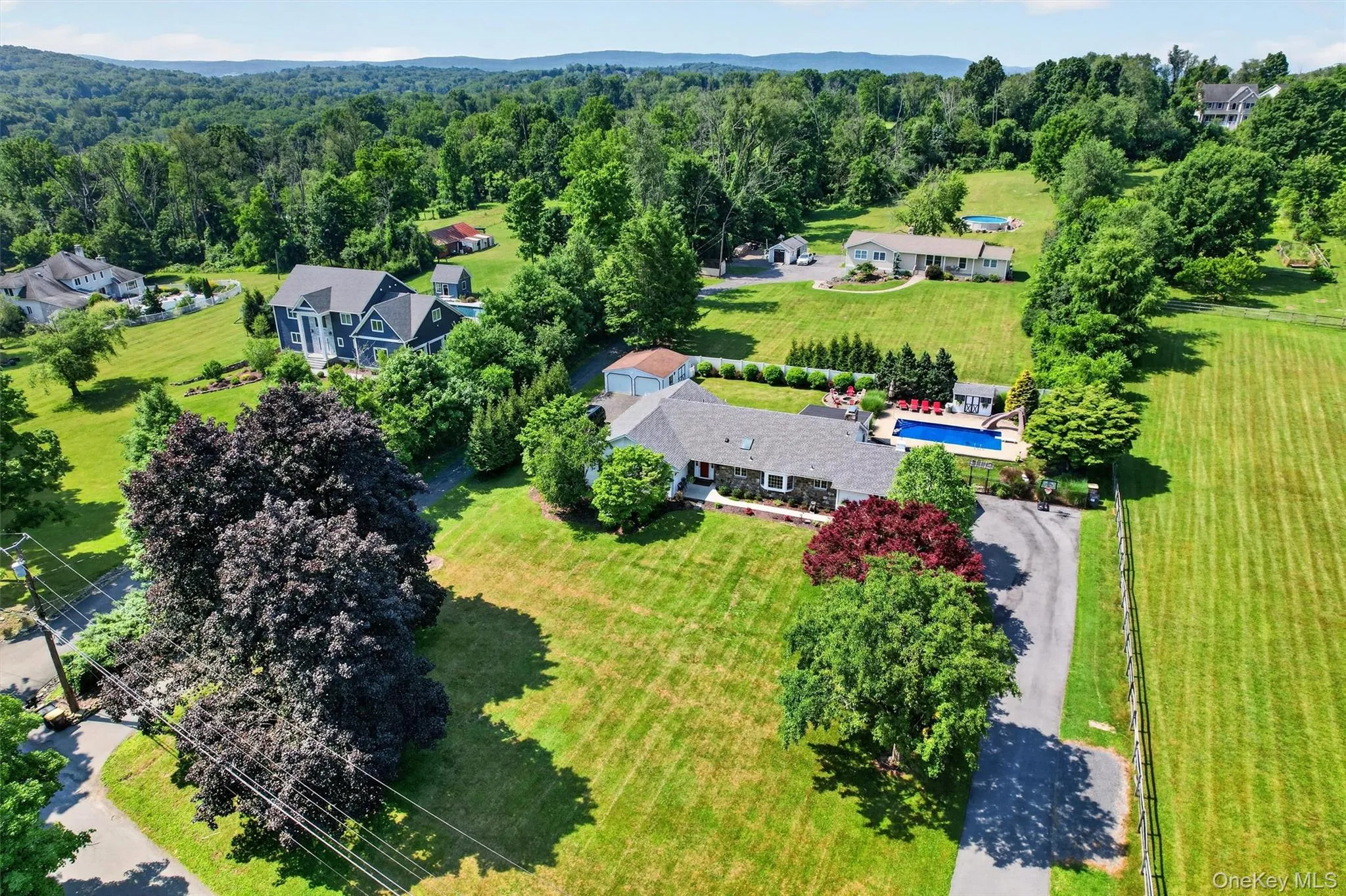 Located on a beautiful, quiet country road with just a few neighboring homes, 5 Hedges Road offers privacy, space, and timeless Warwick charm. Located on a beautiful, quiet country road with just a few neighboring homes, 5 Hedges Road offers privacy, space, and timeless Warwick charm.