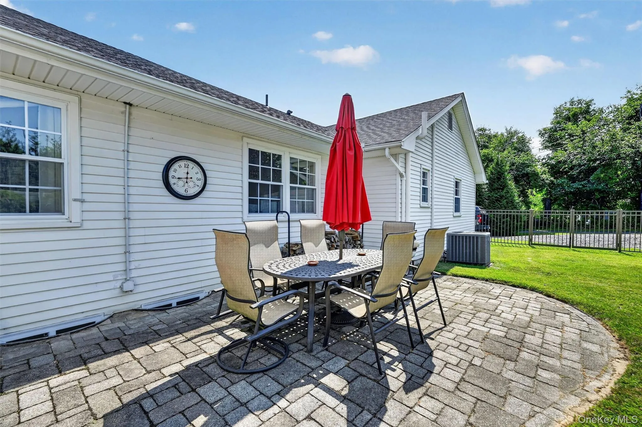 A dedicated patio dining area creates the perfect spot for outdoor meals, morning coffee, or relaxed summer evenings just off the home. A dedicated patio dining area creates the perfect spot for outdoor meals, morning coffee, or relaxed summer evenings just off the home.
