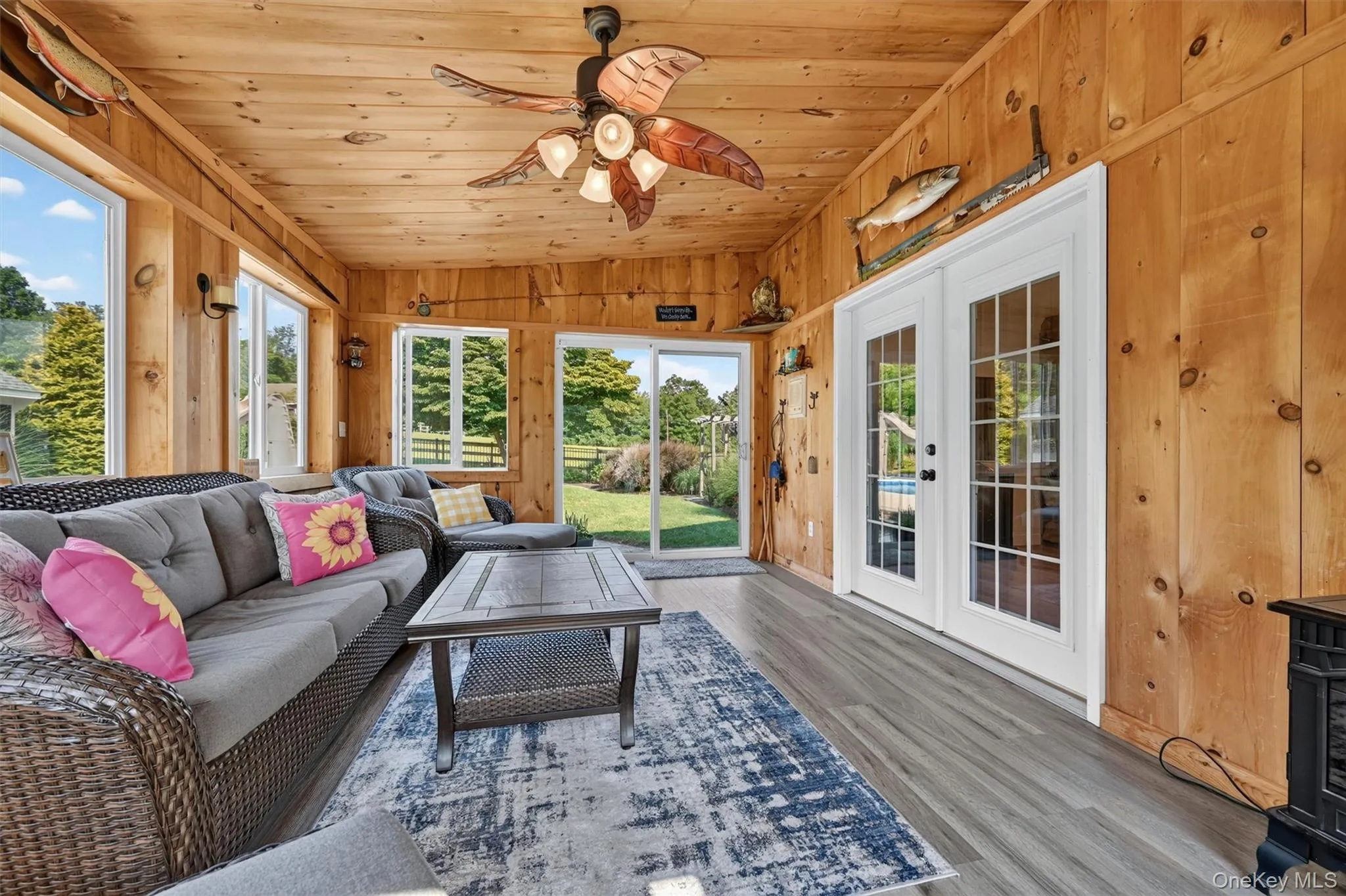 A peaceful screened-in sunroom offers the perfect place to relax, enjoy the breeze, listen to the birds, and take in views of the private backyard. A peaceful screened-in sunroom offers the perfect place to relax, enjoy the breeze, listen to the birds, and take in views of the private backyard.