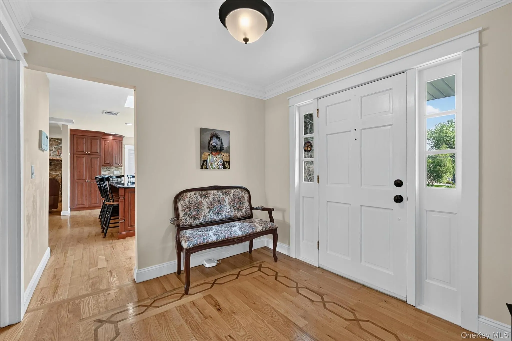 The front entry sits at the heart of the home, offering a natural separation between the living spaces on one side and the bedroom wing on the other. The front entry sits at the heart of the home, offering a natural separation between the living spaces on one side and the bedroom wing on the other.
