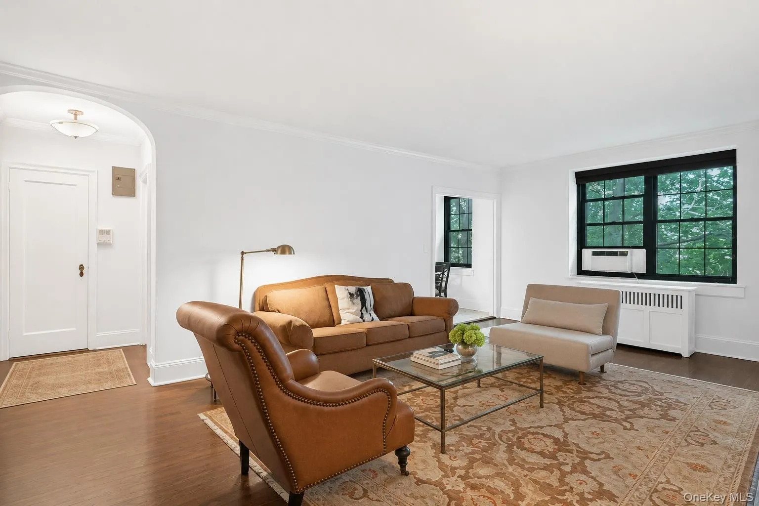 Expansive Living Room, Beautiful Wood Floors with Views of Golf course. This Photo Shows the Relationship between the Foyer, Living Room and Dining Area Expansive Living Room, Beautiful Wood Floors with Views of Golf course. This Photo Shows the Relationship between the Foyer, Living Room and Dining Area