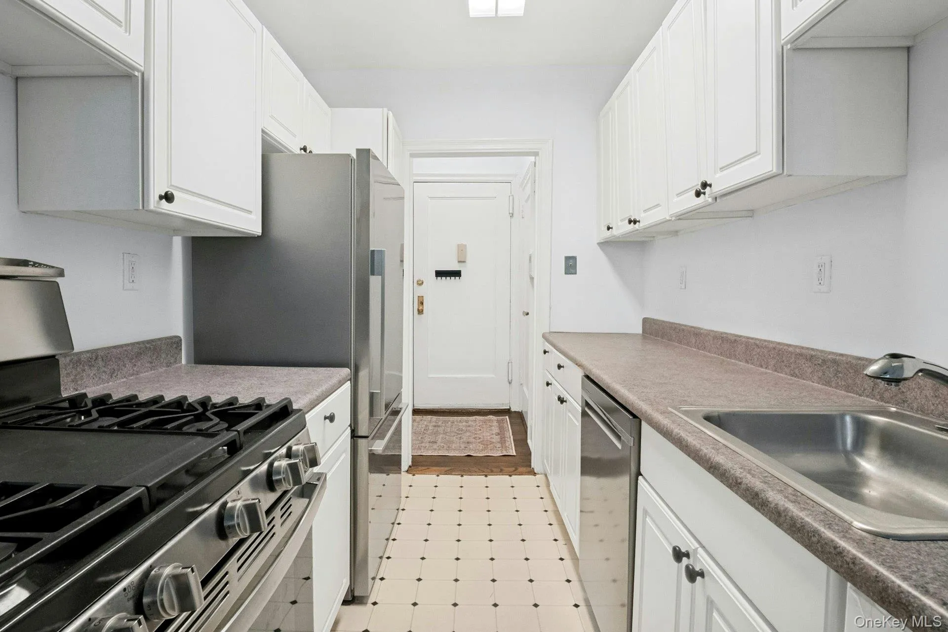 Kitchen with View to Front Entry Kitchen with View to Front Entry
