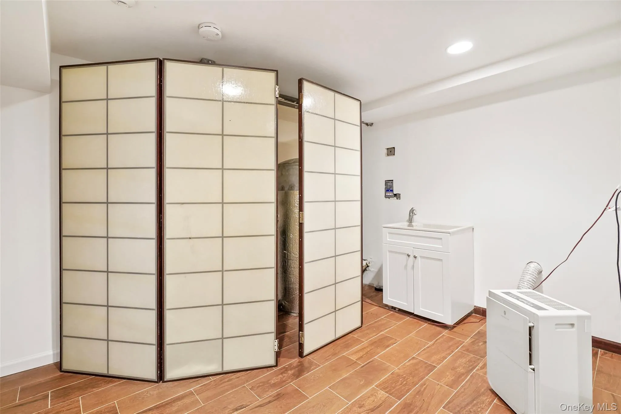 Laundry hookup on entry level; if you want to move the washer/dryer down from the kitchen Laundry hookup on entry level; if you want to move the washer/dryer down from the kitchen