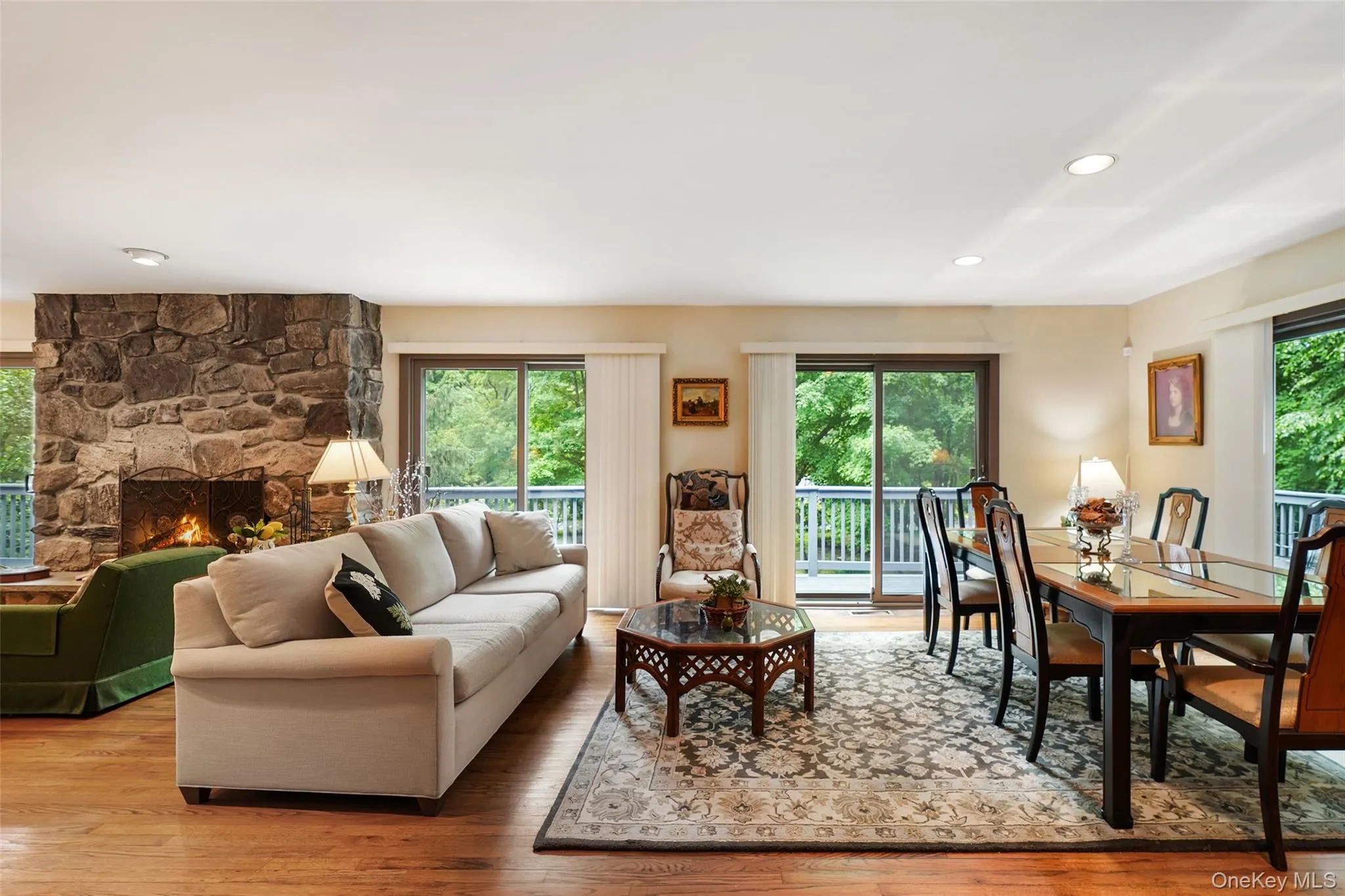Beautiful living room with stone fireplace Beautiful living room with stone fireplace