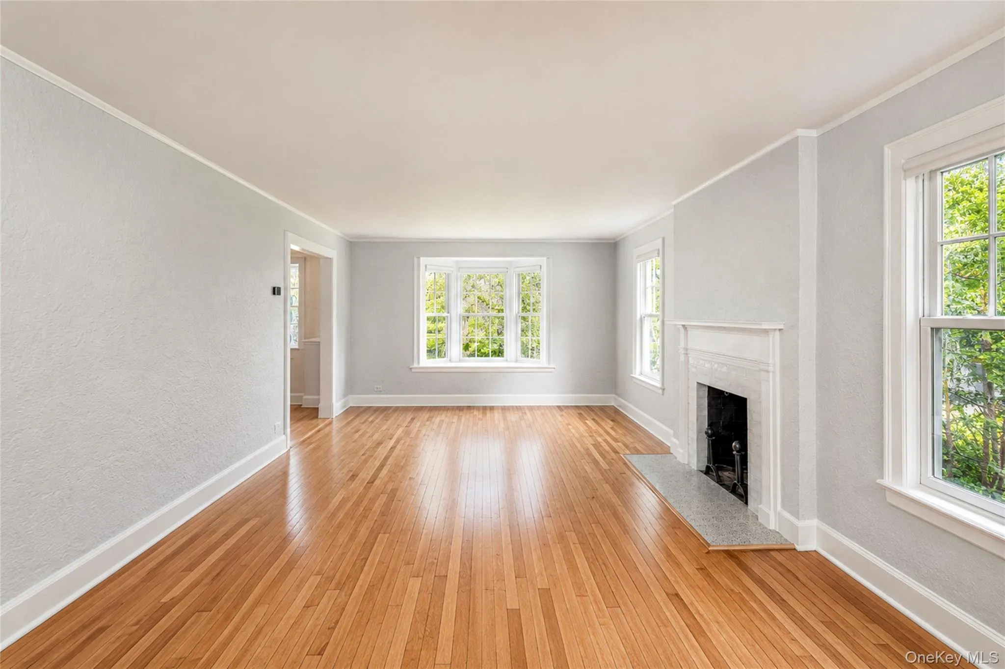 Living Room w/ wood burning fireplace. Living Room w/ wood burning fireplace.