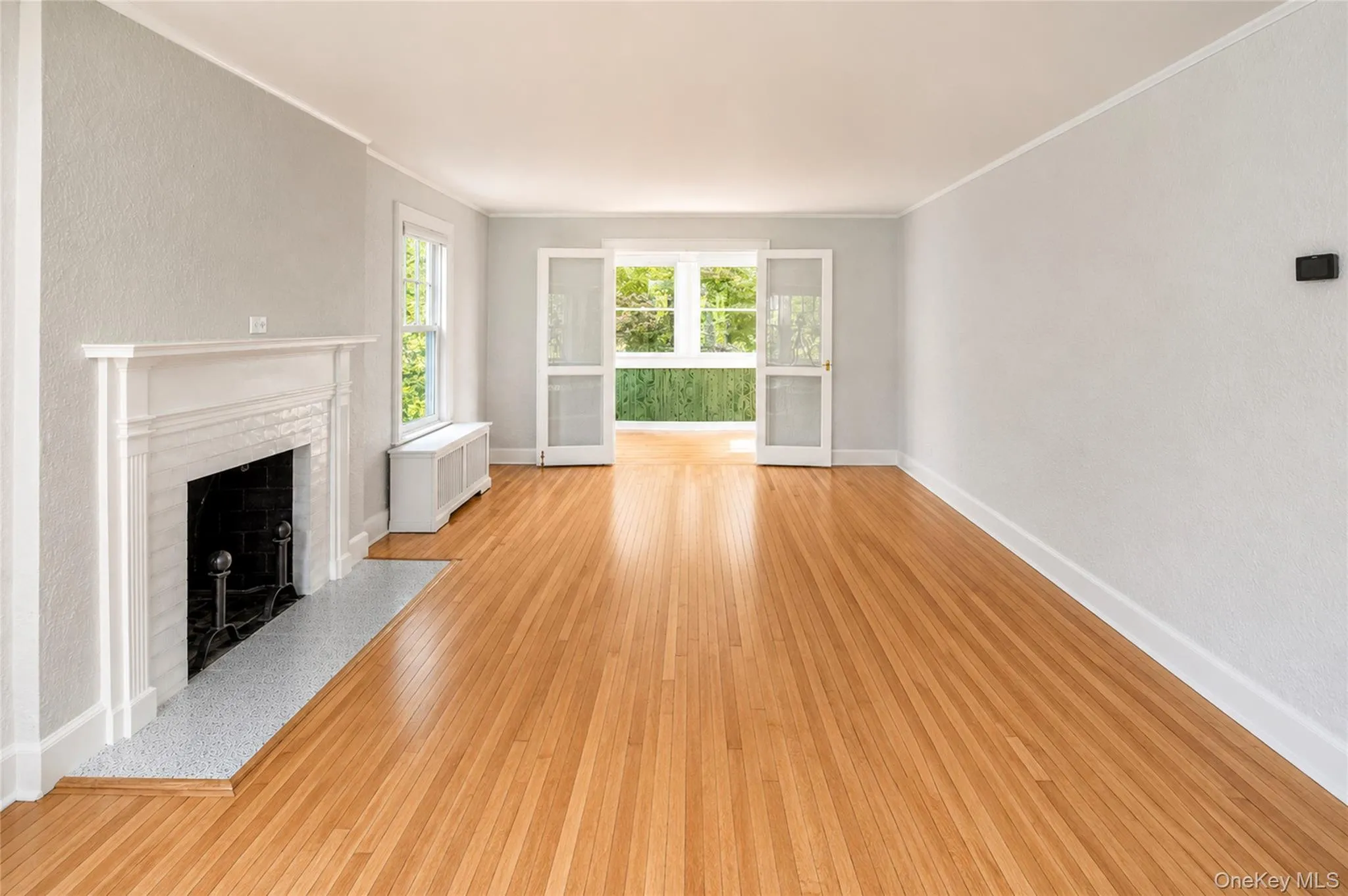 Living room w/ wood burning fire place. Living room w/ wood burning fire place.