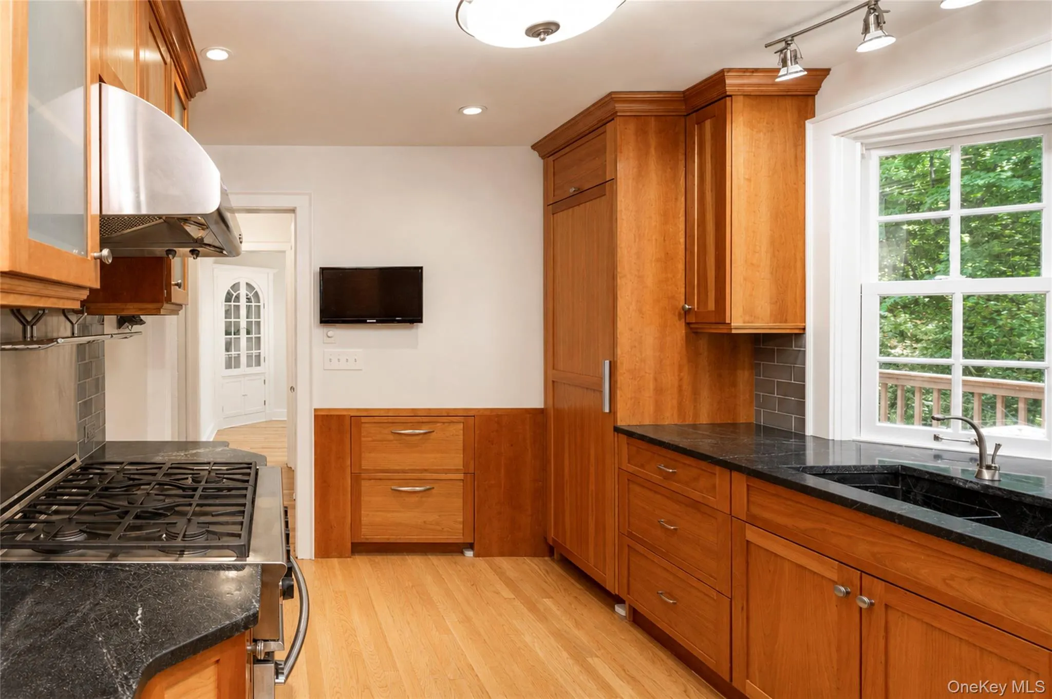 The Kitchen connects to the office/den which has access to the deck The Kitchen connects to the office/den which has access to the deck