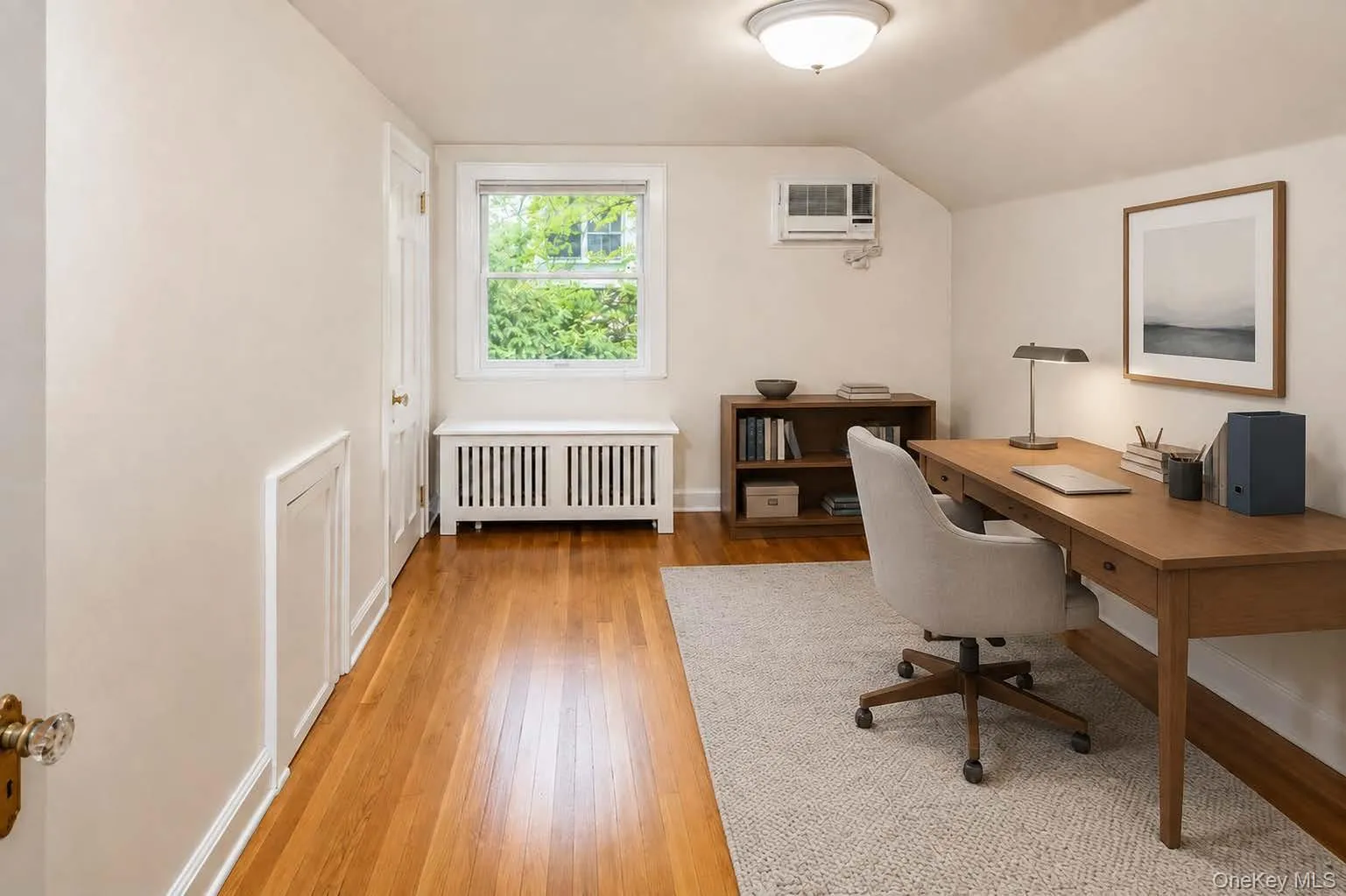 The bedroom OR OFFICE and bath over the garage has a private entry from the kitchen. Virtually staged. The bedroom OR OFFICE and bath over the garage has a private entry from the kitchen. Virtually staged.
