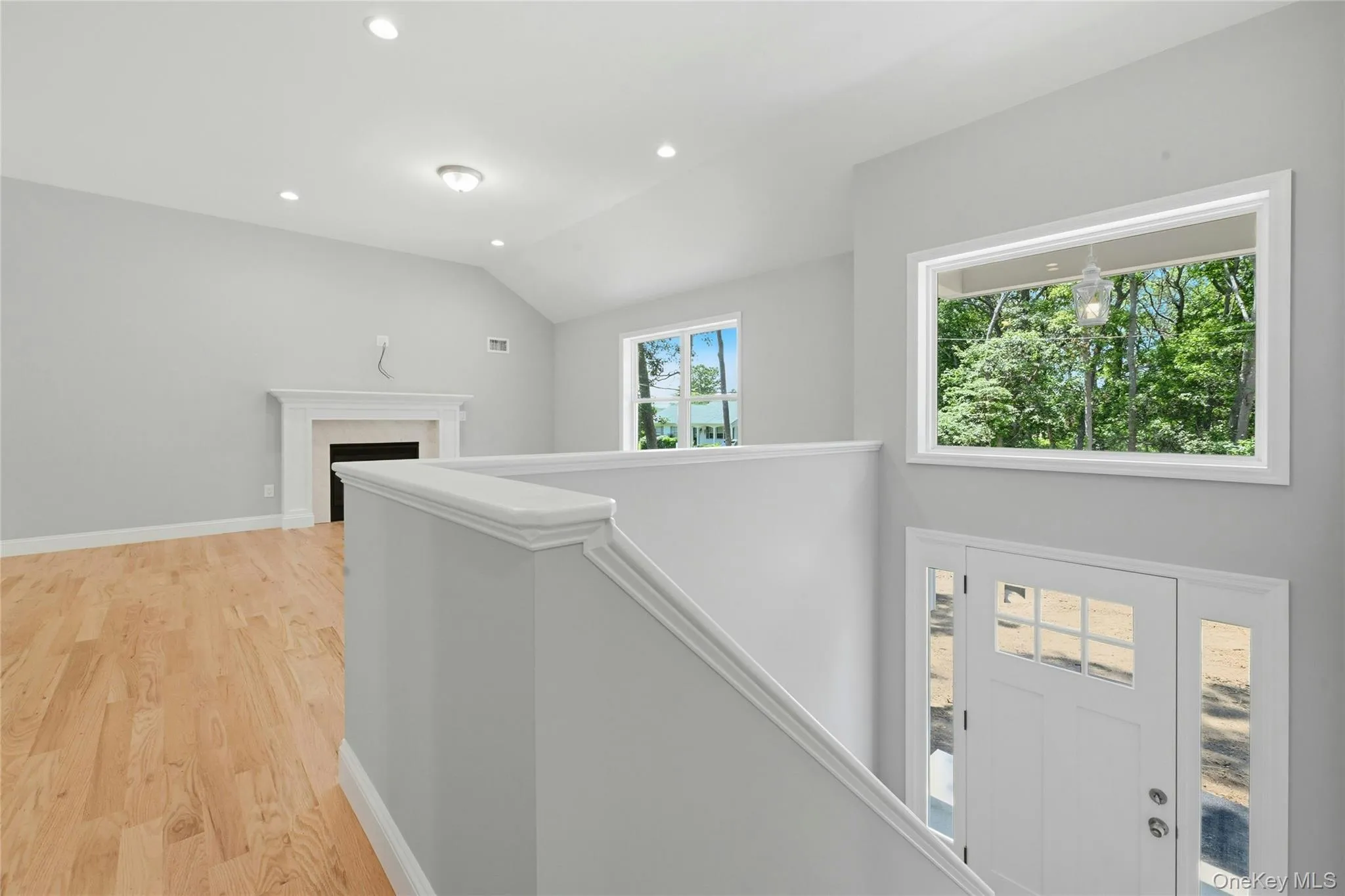 A large picture window above the entry door fills the foyer with an abundance of natural light. A large picture window above the entry door fills the foyer with an abundance of natural light.