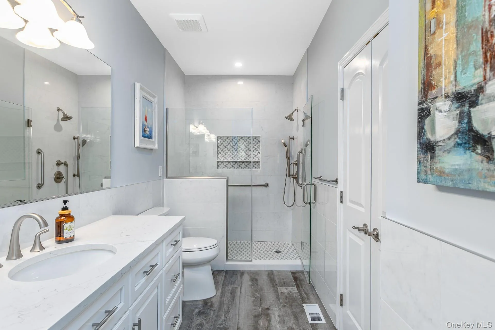 Contemporary Primary bathroom featuring a spacious glass-enclosed shower Contemporary Primary bathroom featuring a spacious glass-enclosed shower