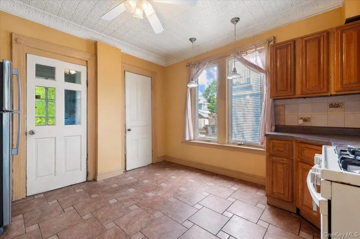 Kitchen- Door to backyard Kitchen- Door to backyard