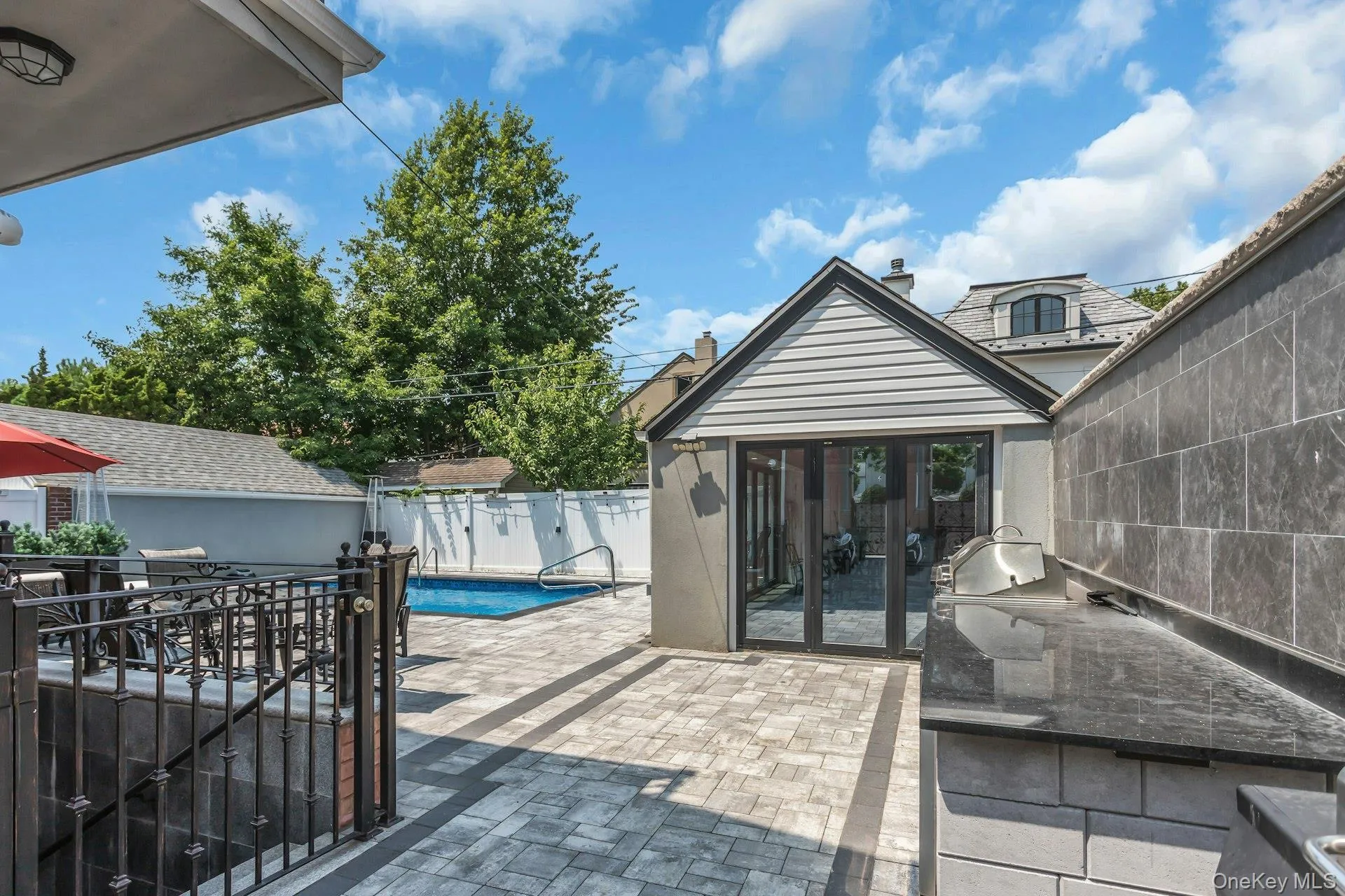 Converted garage, easy to convert back. Finished tile floor, folding glass doors, sub panel electic service Converted garage, easy to convert back. Finished tile floor, folding glass doors, sub panel electic service