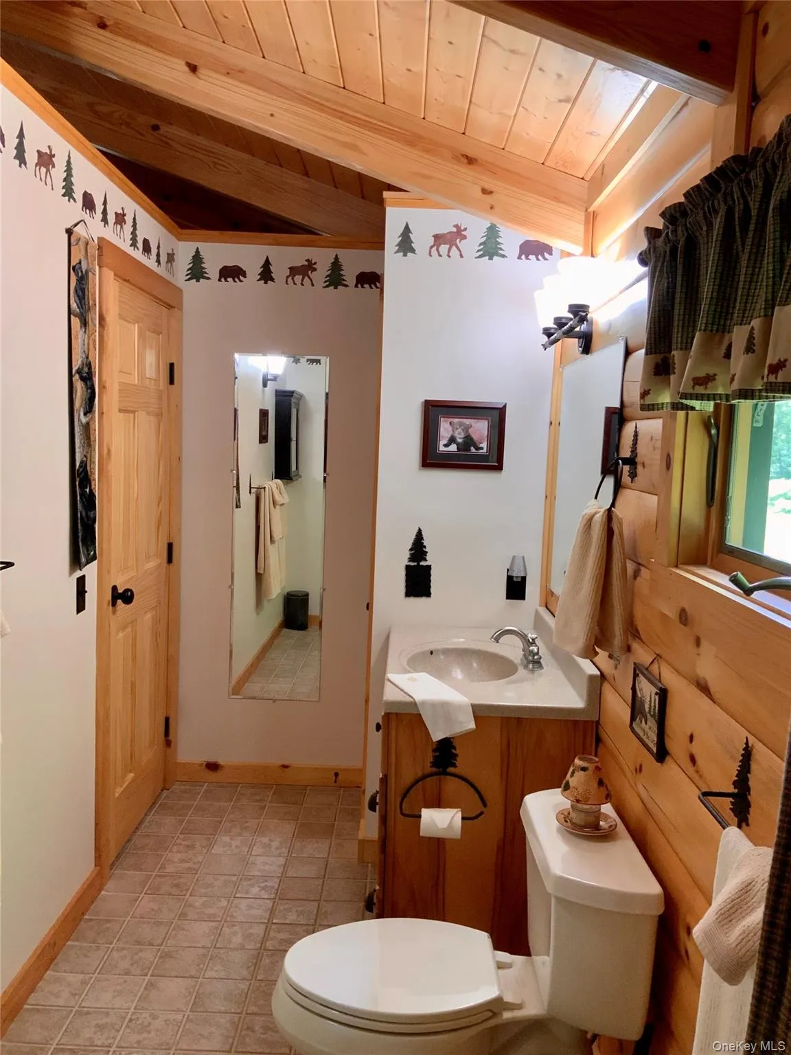 This spacious bathroom features ample storage. This spacious bathroom features ample storage.