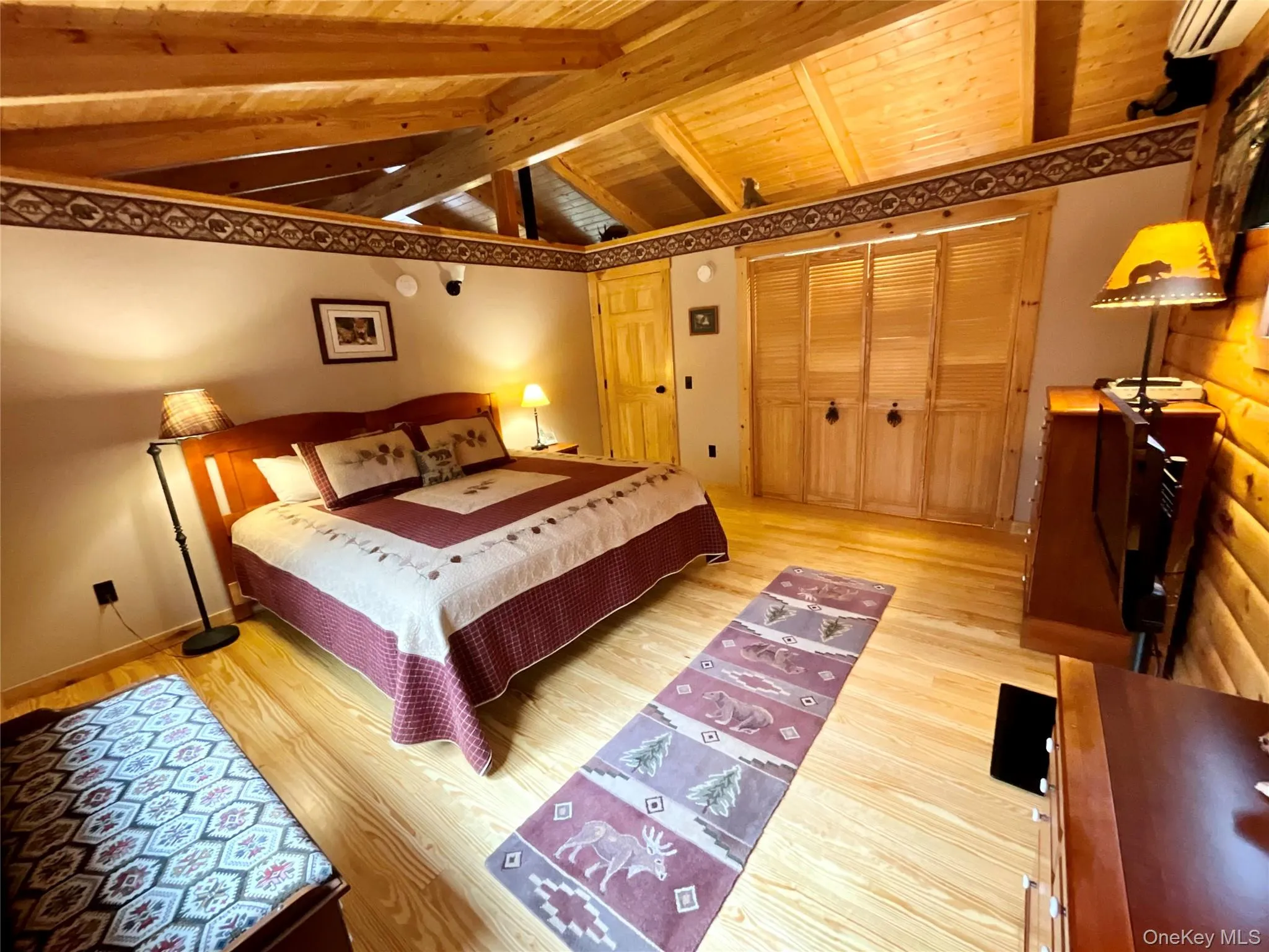 The bedroom has ample closet space and rustic charm. The bedroom has ample closet space and rustic charm.
