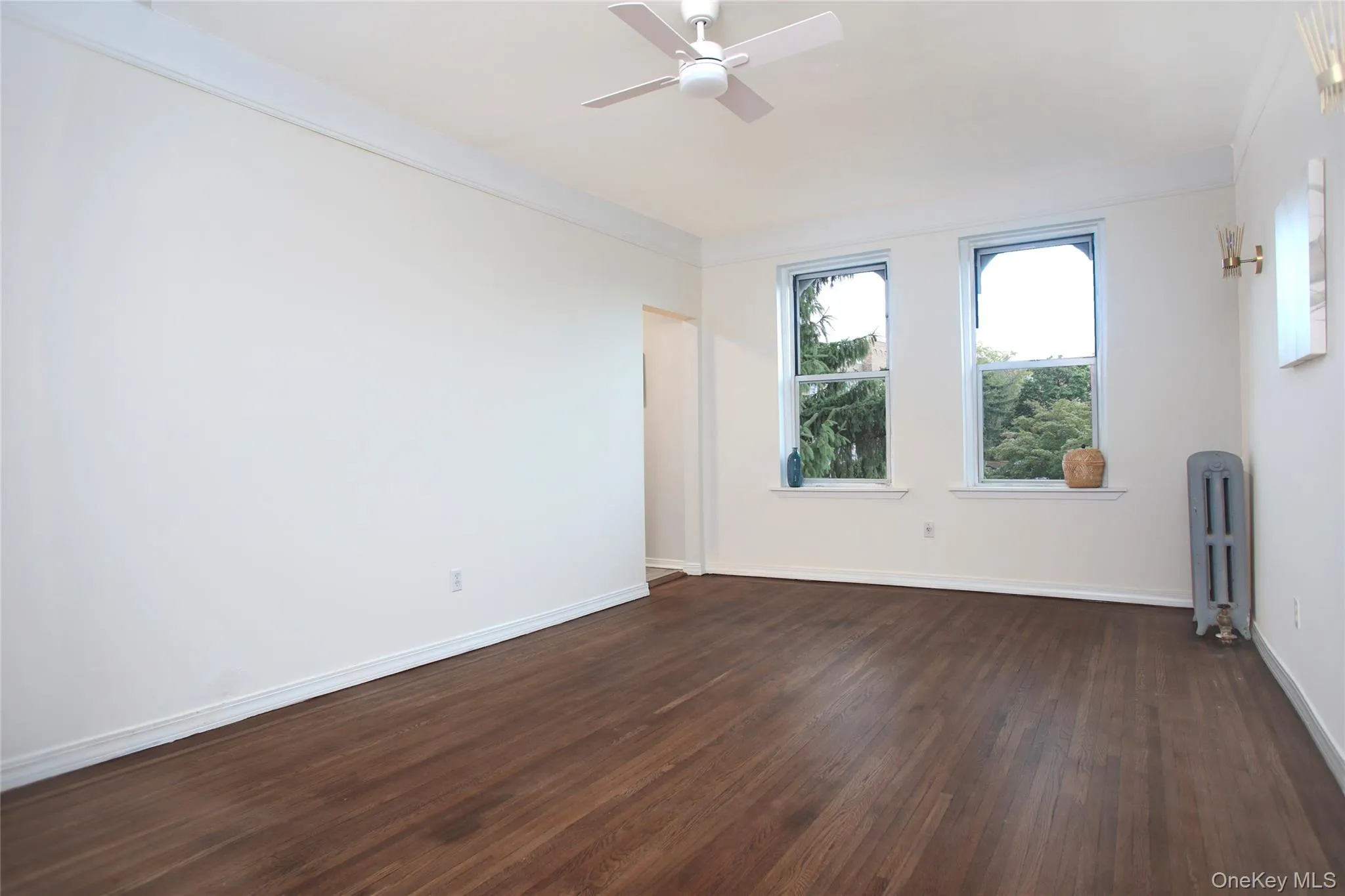 Spacious Living room with high Ceilings and Sunny Courtyard views. Spacious Living room with high Ceilings and Sunny Courtyard views.