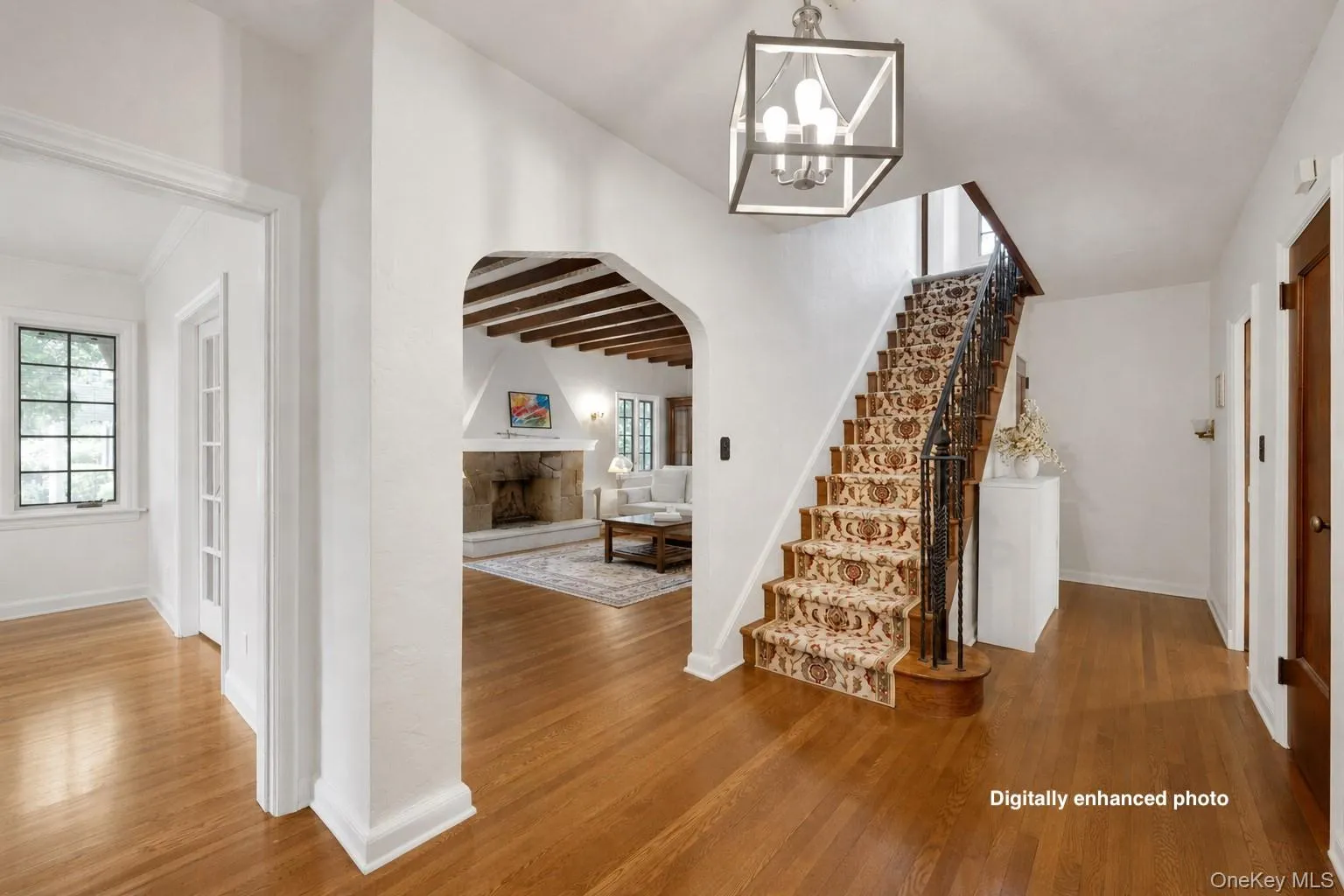 Digitally enhanced photo- paint color in the room on the left was virtually staged. Digitally enhanced photo- paint color in the room on the left was virtually staged.