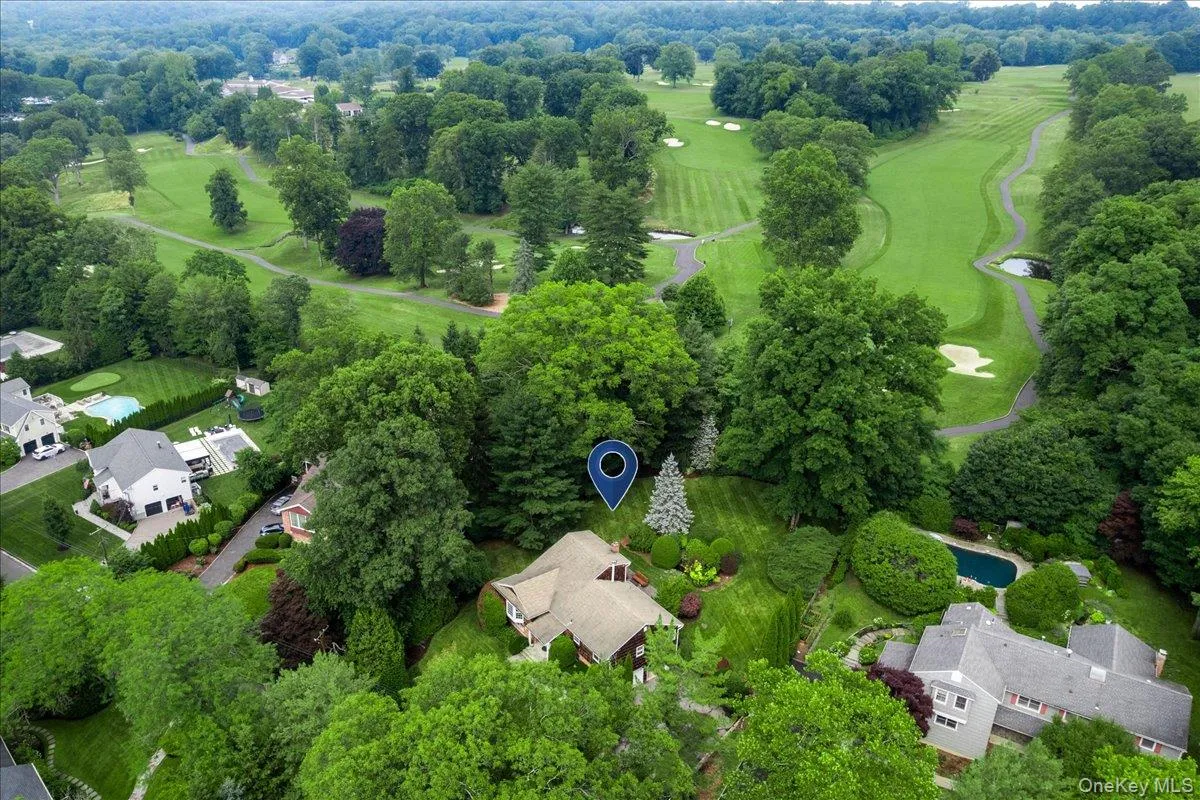 Aerial view features 35 Pinehurst abutting Brae Burn Golf course Aerial view features 35 Pinehurst abutting Brae Burn Golf course