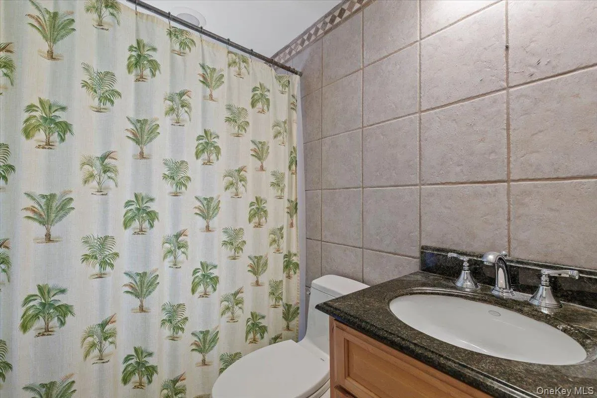 Full bath located on second level off the back staircase Full bath located on second level off the back staircase