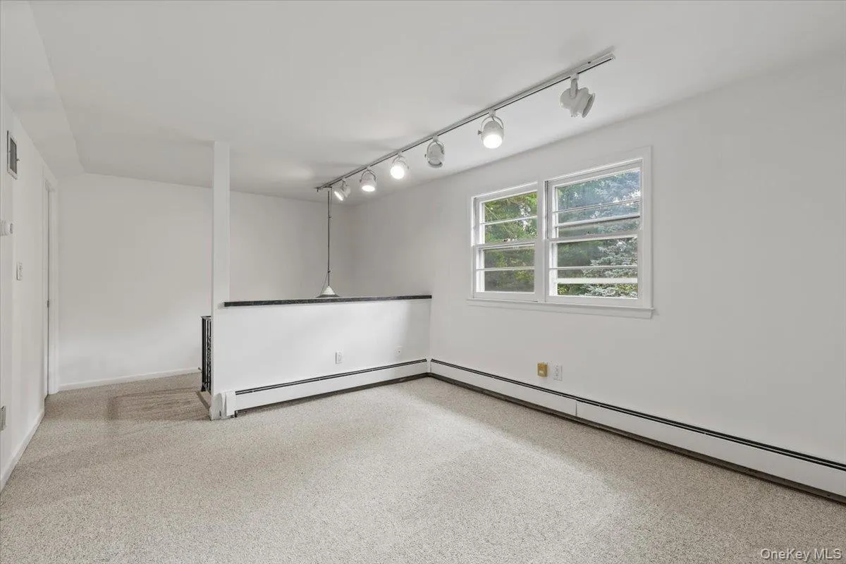 Accessible via back staircase w/ full bath and ample storage. Accessible via back staircase w/ full bath and ample storage.
