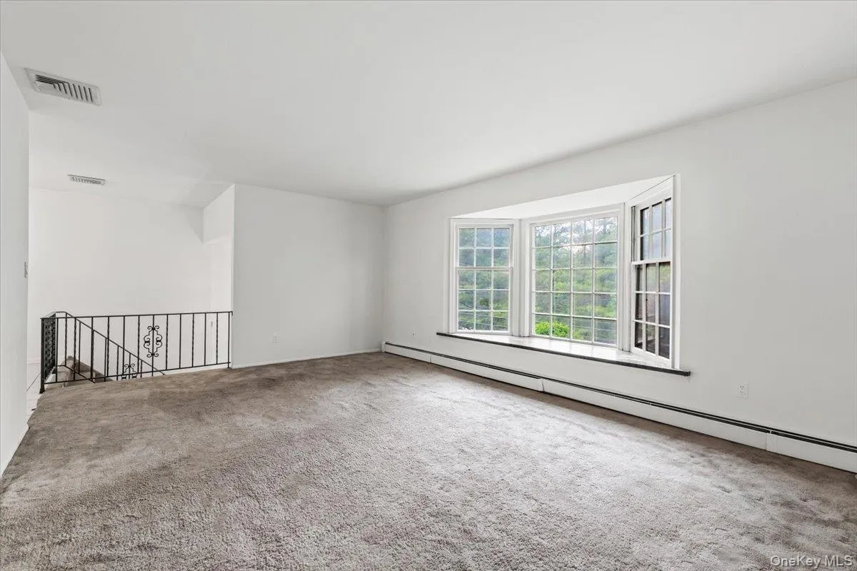 Generous living room which flows to dining room. Perfect for entertaining. Generous living room which flows to dining room. Perfect for entertaining.