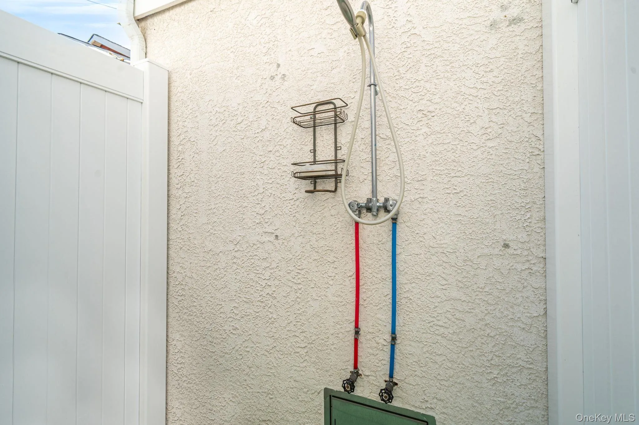 Convenient outdoor shower, perfect after a day at the beach. Convenient outdoor shower, perfect after a day at the beach.