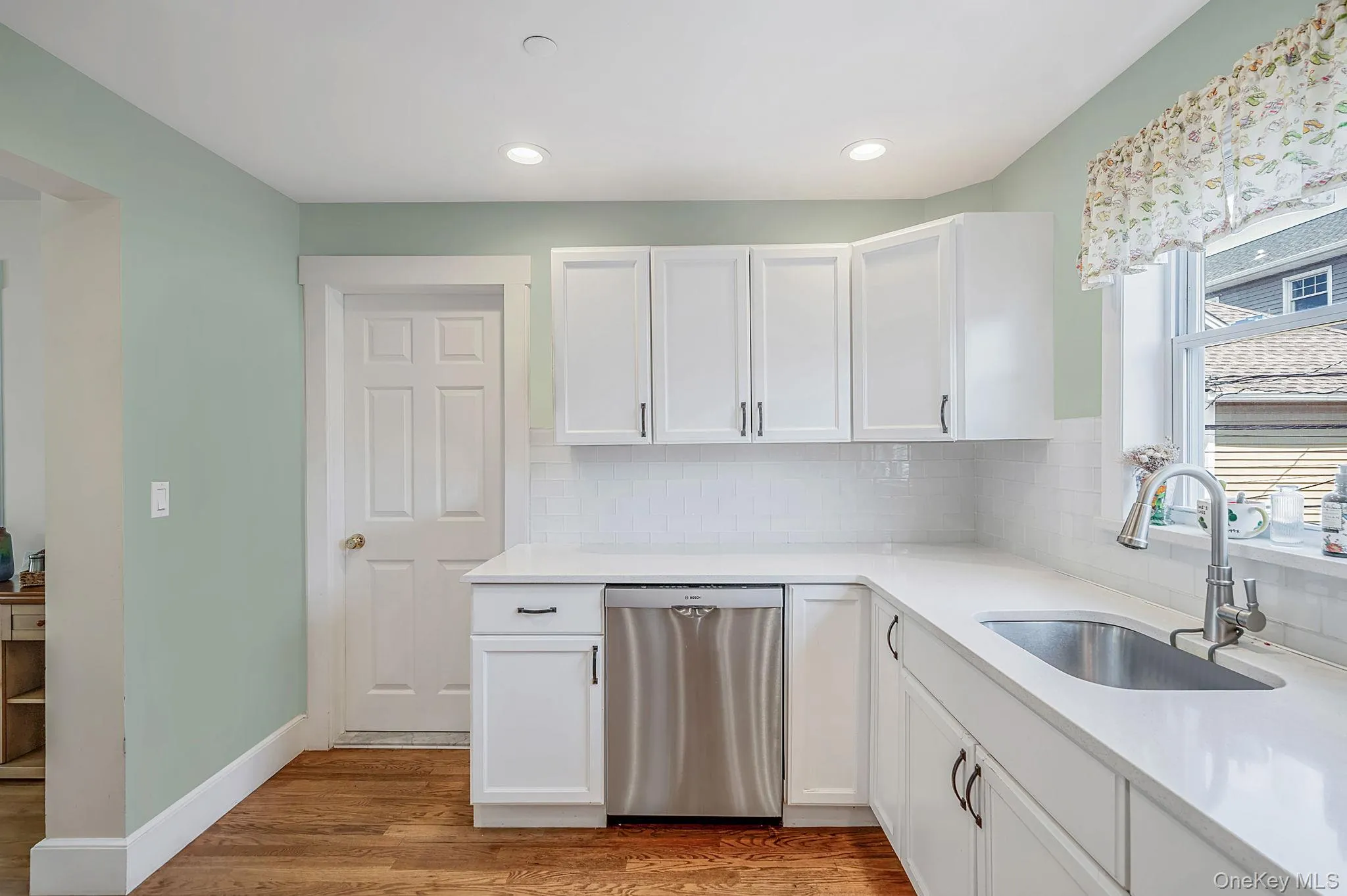 Bright kitchen with ample cabinetry and generous counter space Bright kitchen with ample cabinetry and generous counter space