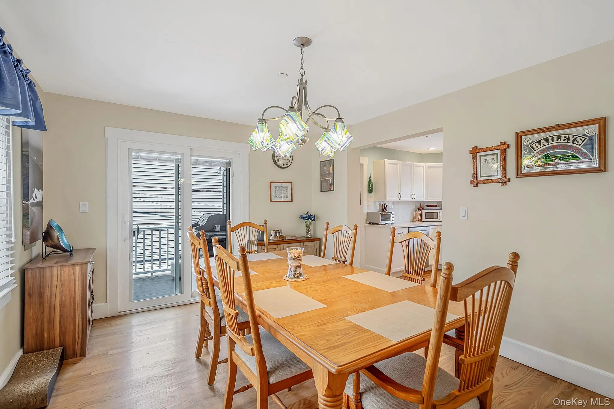 Light-filled dining area with access to second level balcony Light-filled dining area with access to second level balcony