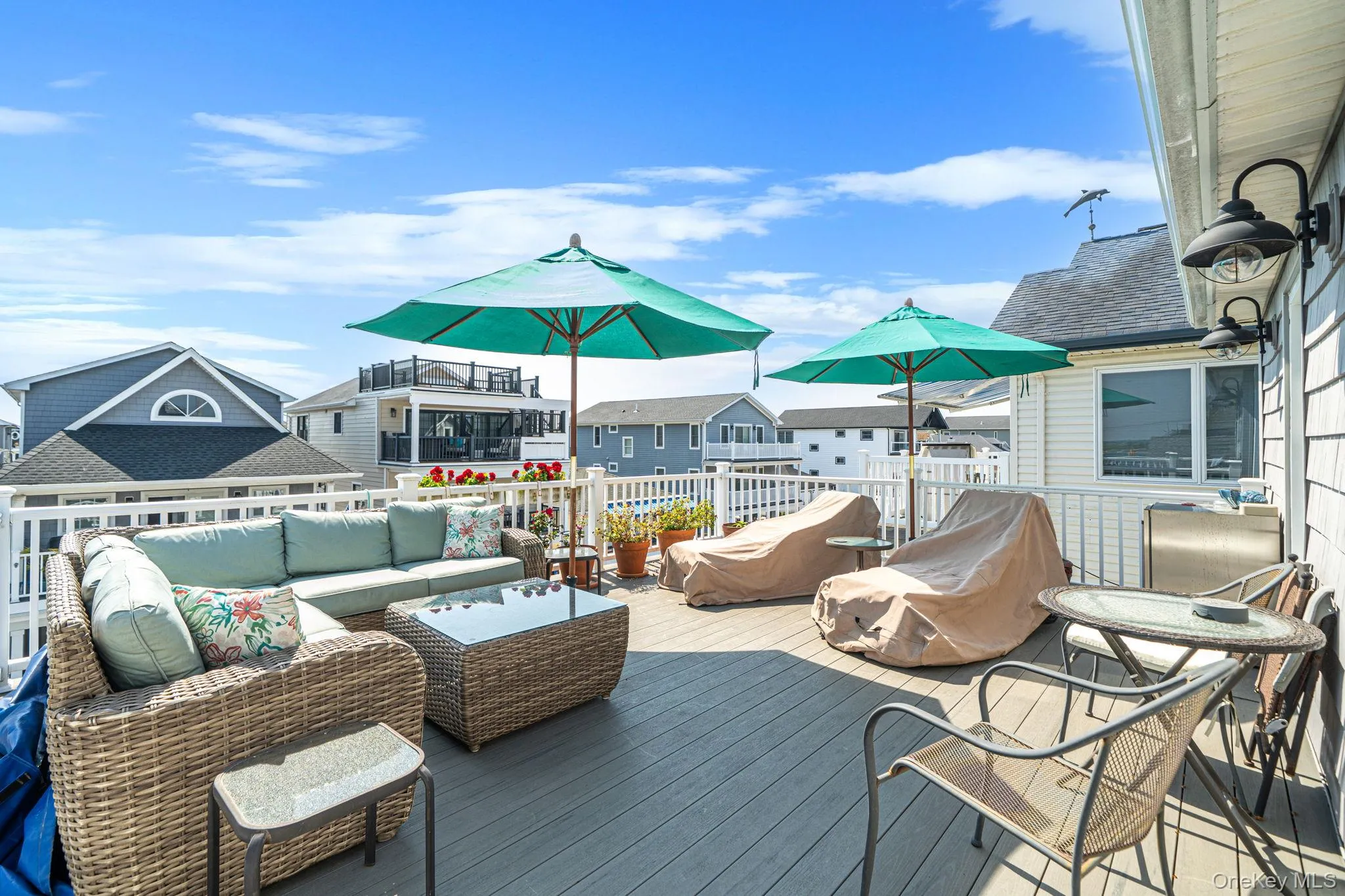 Expansive composite deck offering exceptional space for outdoor dining, entertaining, and relaxing. Expansive composite deck offering exceptional space for outdoor dining, entertaining, and relaxing.