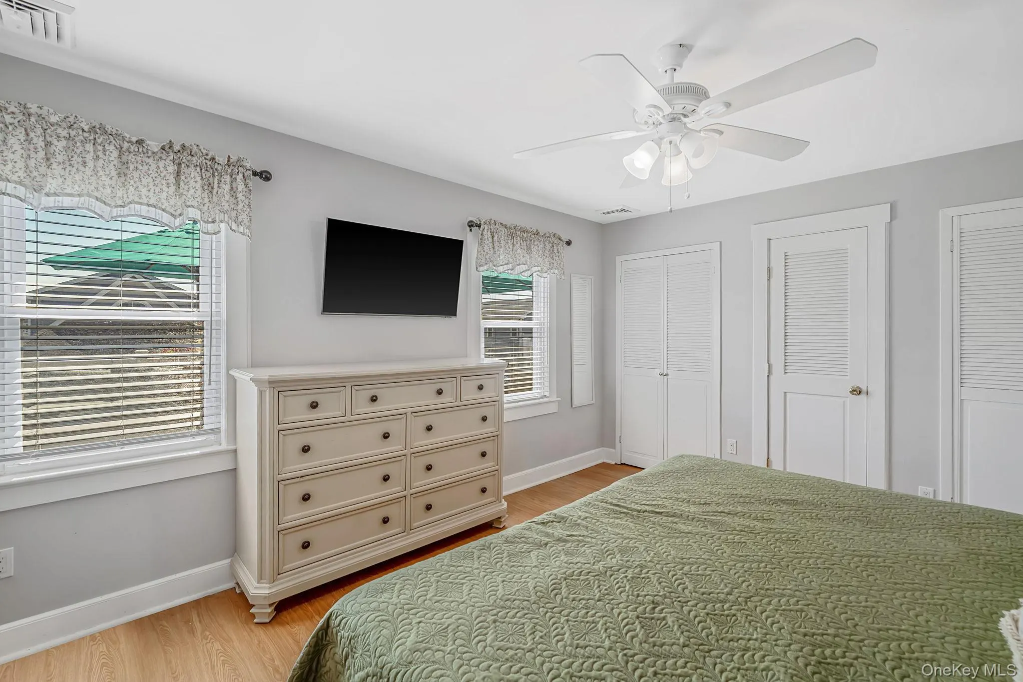 Spacious primary bedroom with abundant natural light and generous closet space. Spacious primary bedroom with abundant natural light and generous closet space.