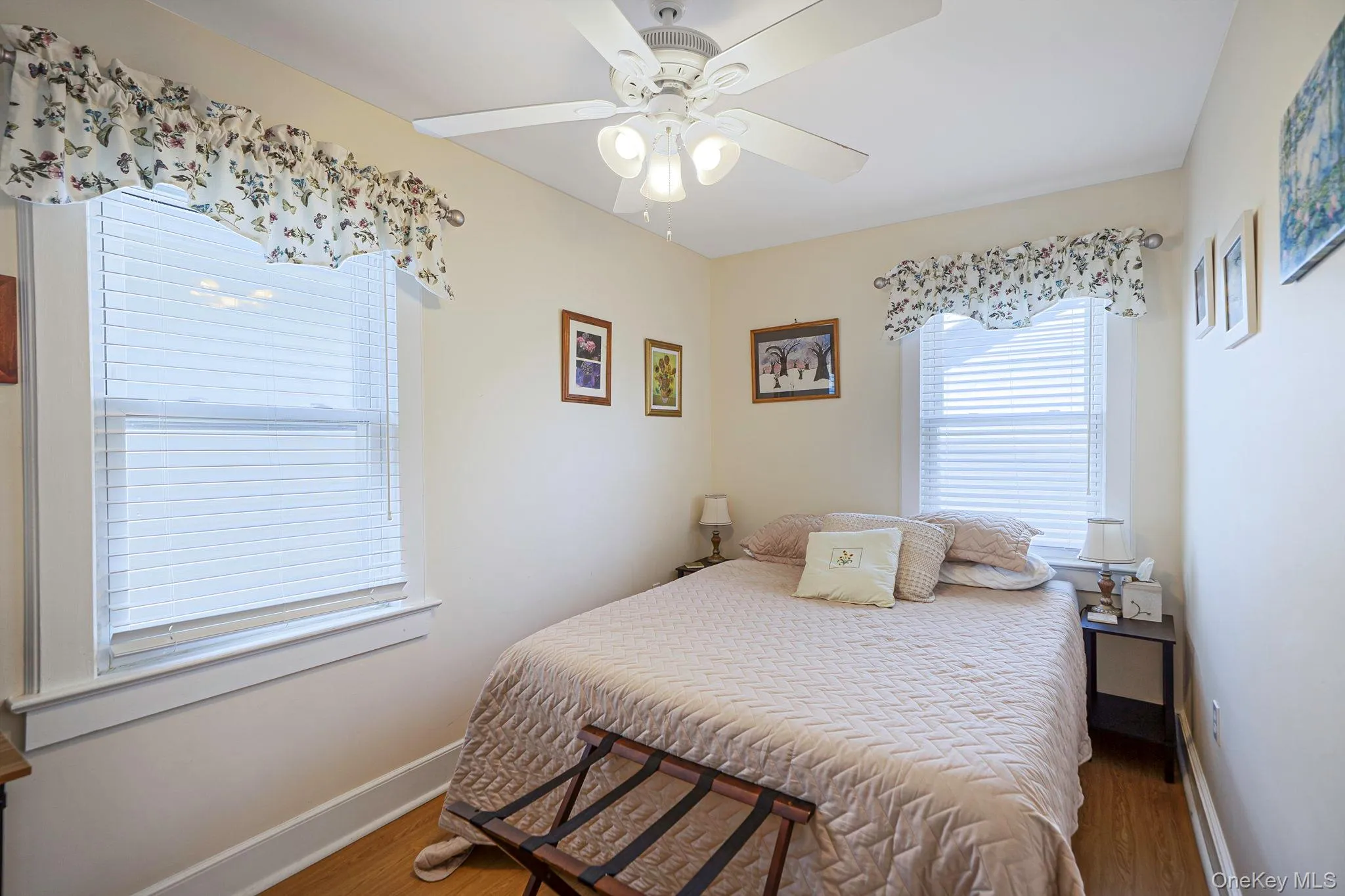 Inviting third-level bedroom filled with natural light. Inviting third-level bedroom filled with natural light.