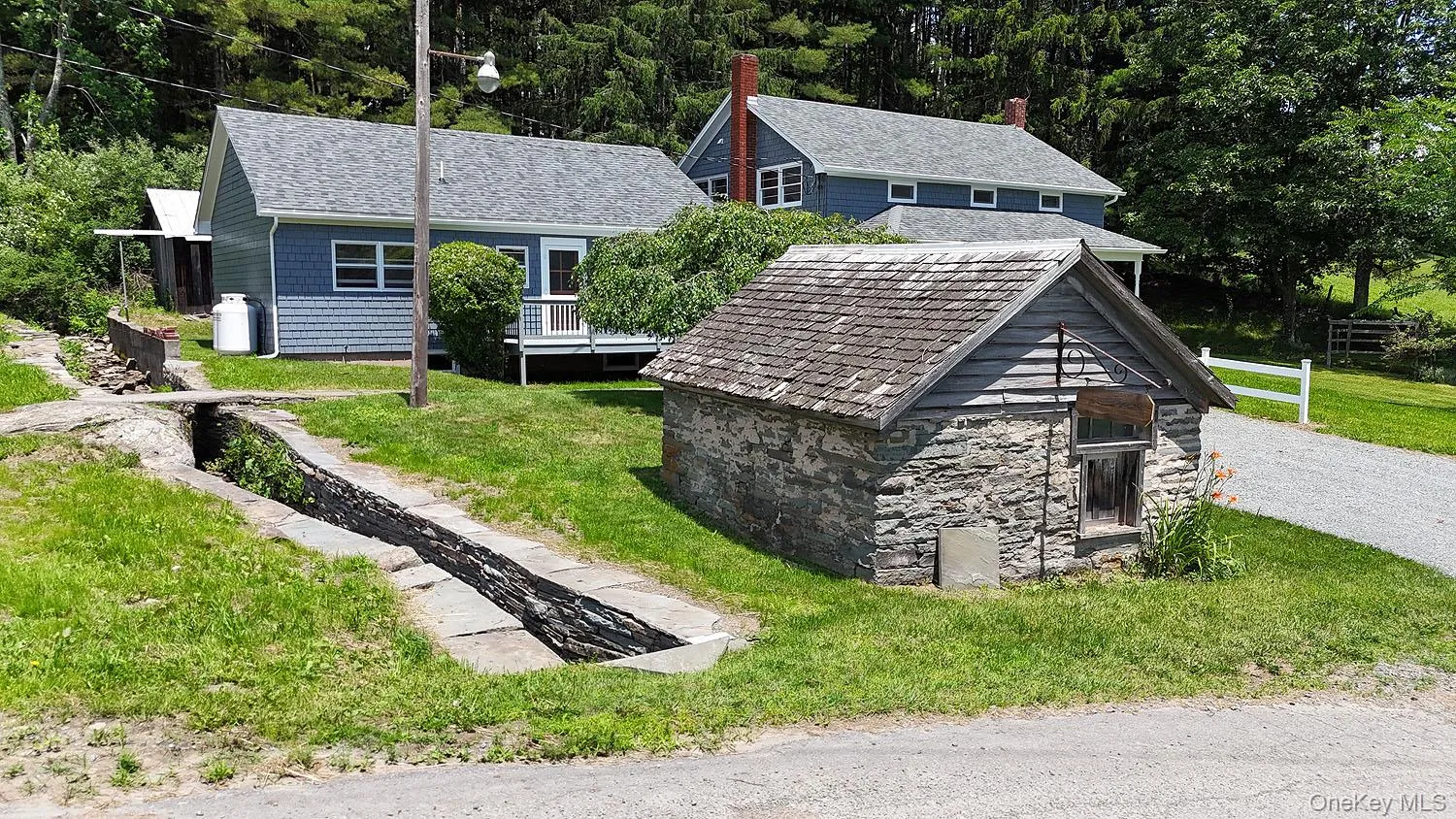 Beautiful stone outbuilding! Creek runs on left side of house Beautiful stone outbuilding! Creek runs on left side of house