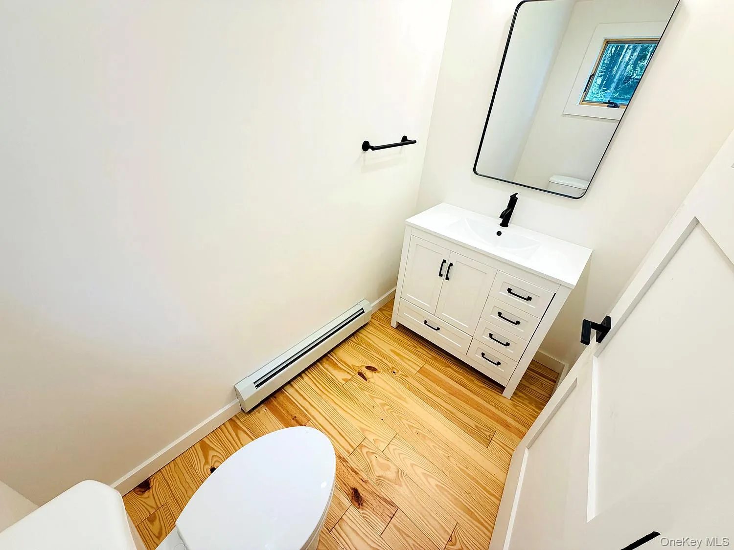 Half bath off the laundry area Half bath off the laundry area