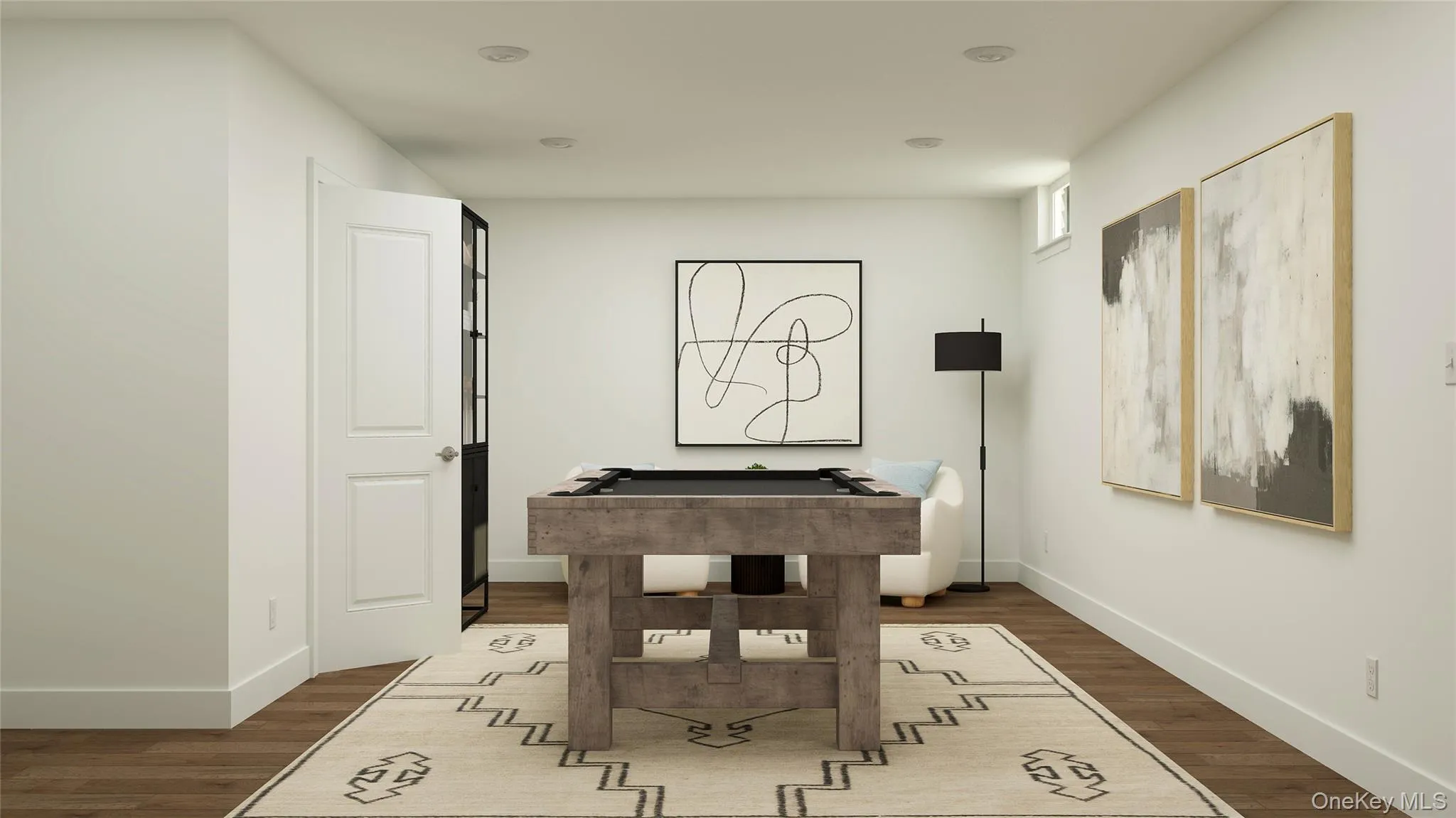 Playroom featuring dark wood-type flooring and billiards table Playroom featuring dark wood-type flooring and billiards table
