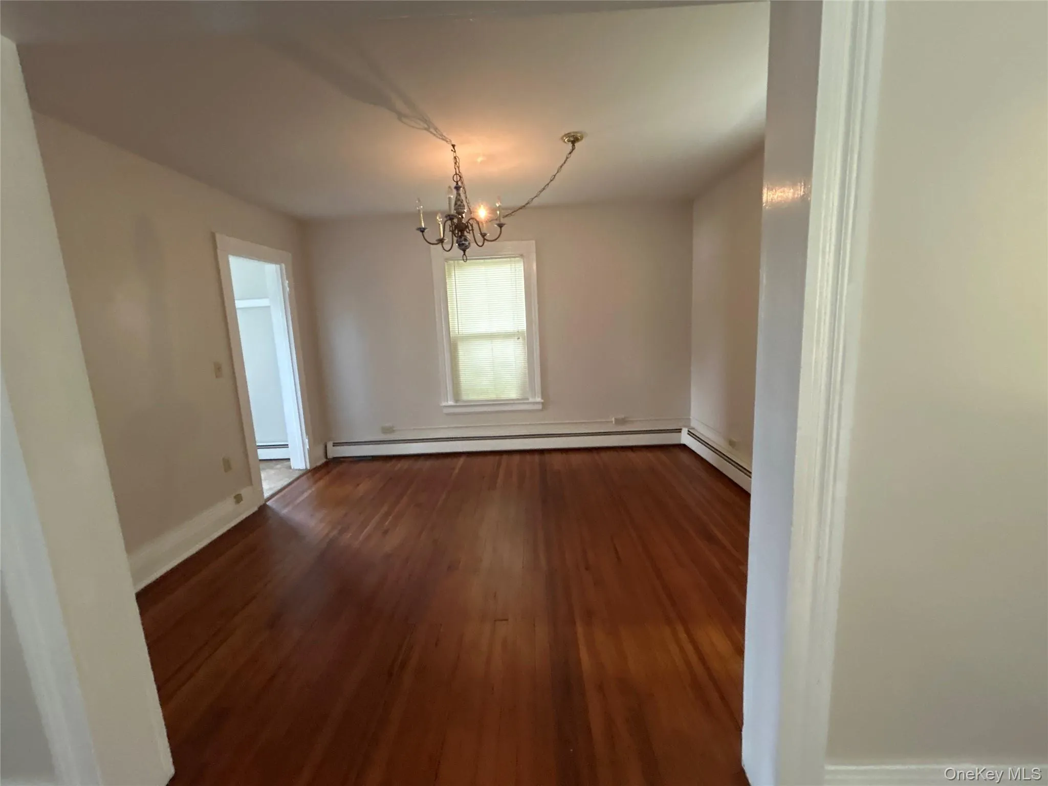 Spacious dining room with wood floors Spacious dining room with wood floors