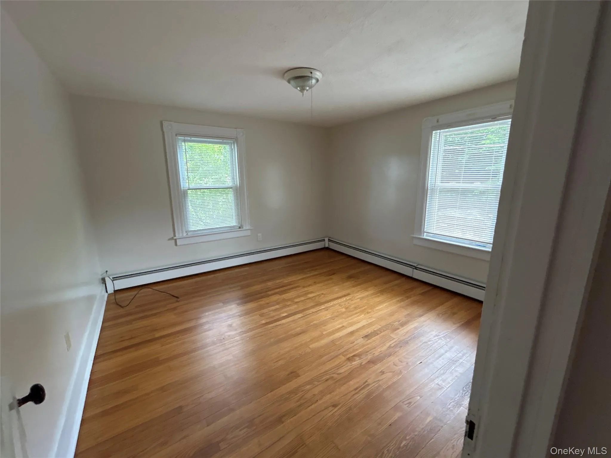 Two of 3 Bedrooms with wood floors Two of 3 Bedrooms with wood floors