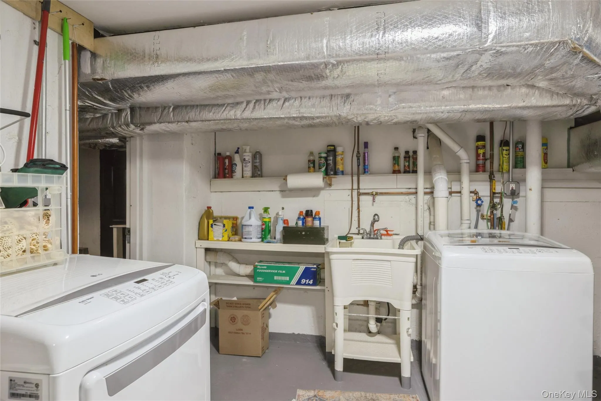 Basement 2nd laundry and 2 separate CAC units and 2 heating systems Basement 2nd laundry and 2 separate CAC units and 2 heating systems