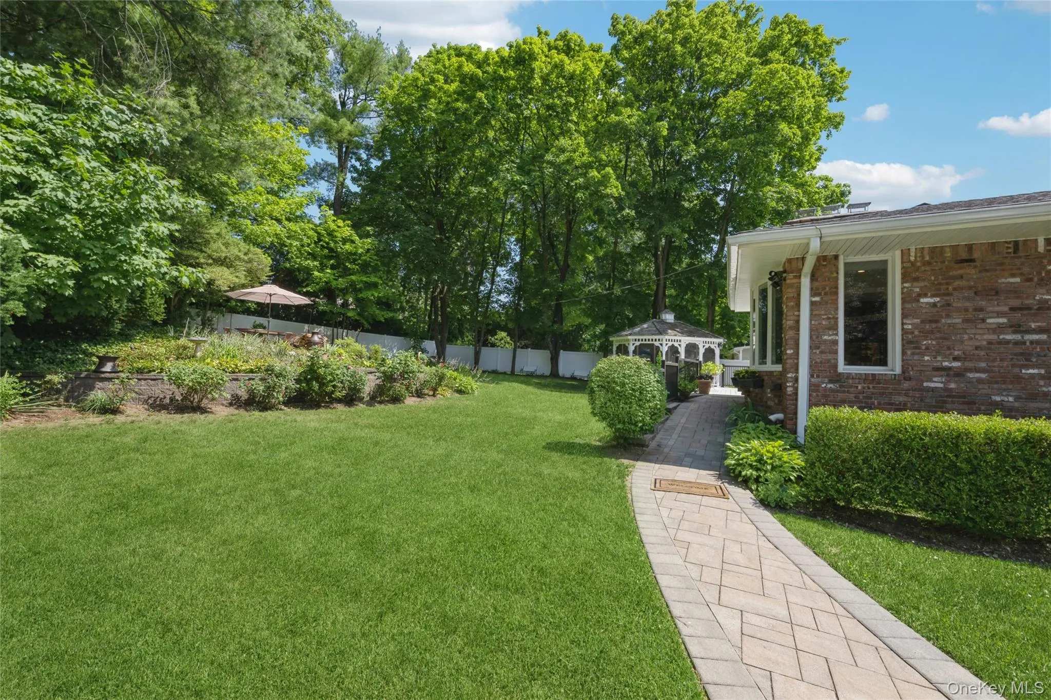 Handicap access ramp to the back yard and 1st floor and another to the lower level from the spacious 2 car garage Handicap access ramp to the back yard and 1st floor and another to the lower level from the spacious 2 car garage