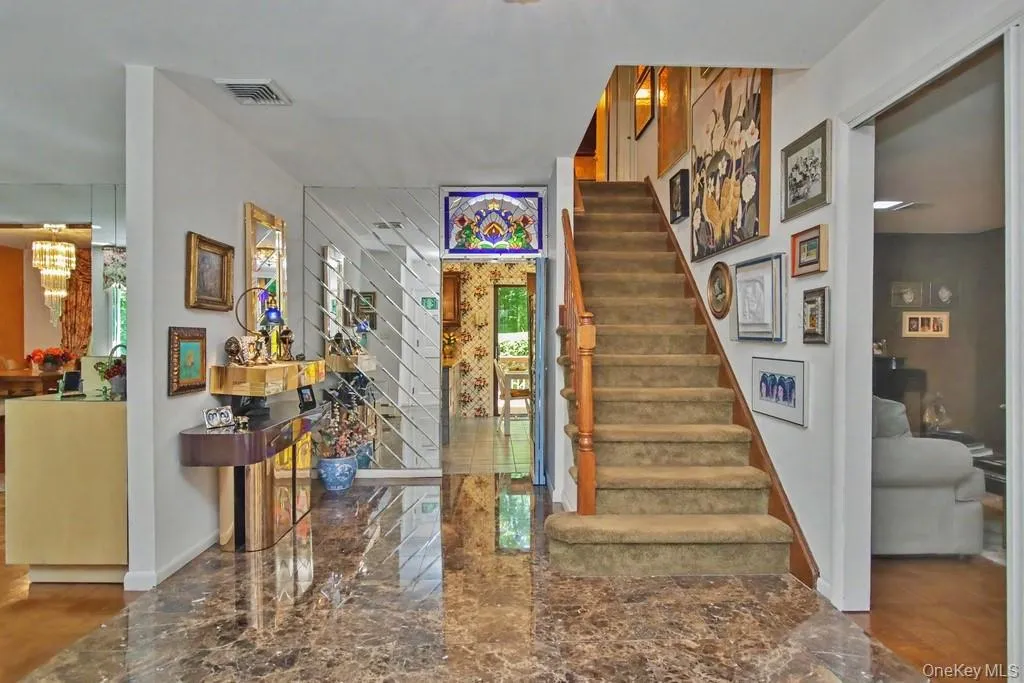 Entry way has marble floors Entry way has marble floors