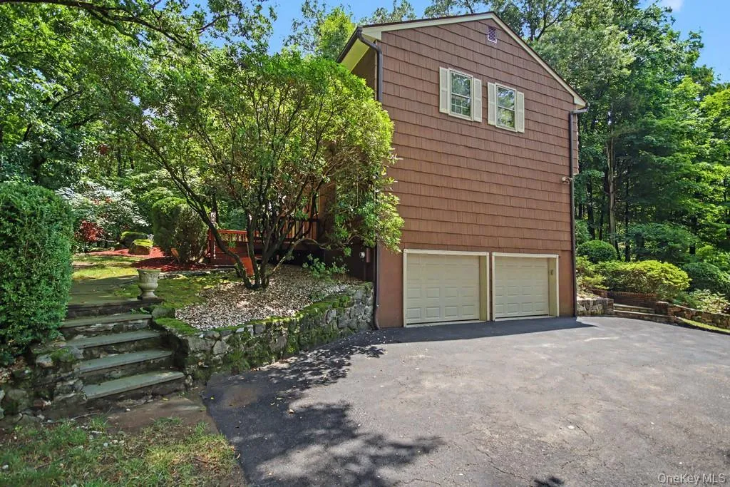 Attached two car garage and driveway parking Attached two car garage and driveway parking