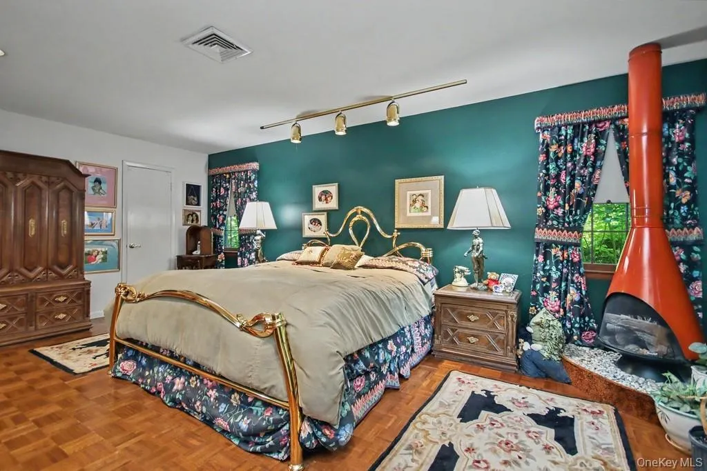 Primary Bedroom has an artificial wood burning stove Primary Bedroom has an artificial wood burning stove