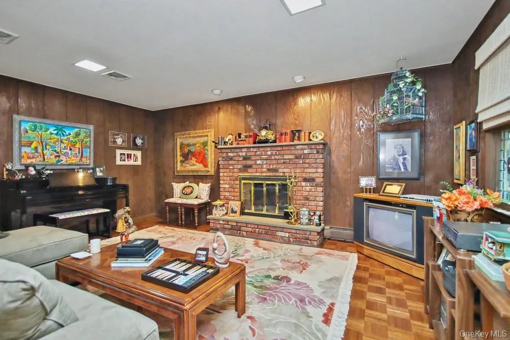 Parquet floors and paneled walls in family room Parquet floors and paneled walls in family room