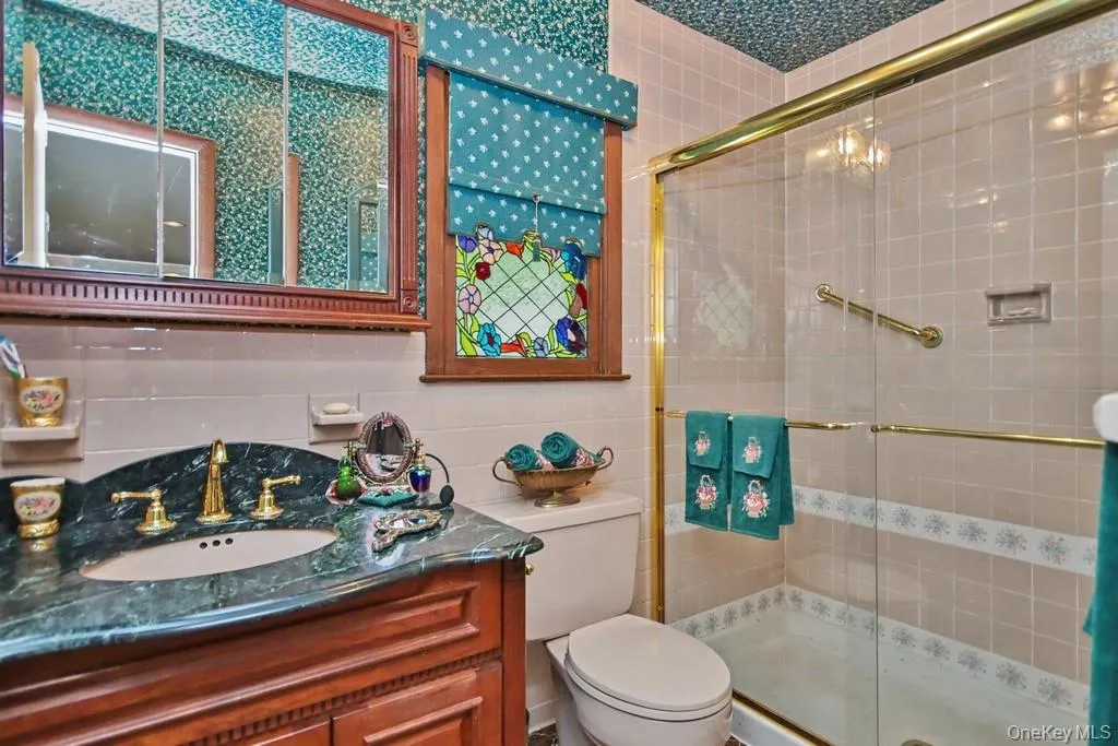 Primary Bathroom has a marble vanity and oversized shower Primary Bathroom has a marble vanity and oversized shower